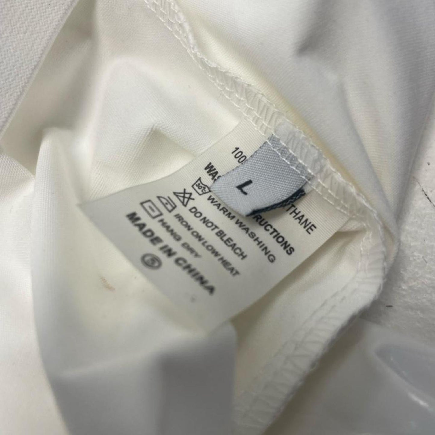 White faux leather ruched pants