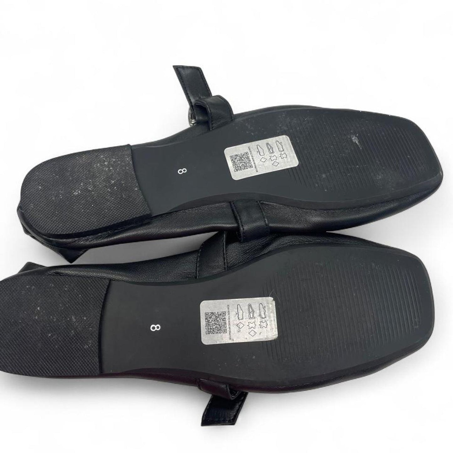 Black leather ballet flats