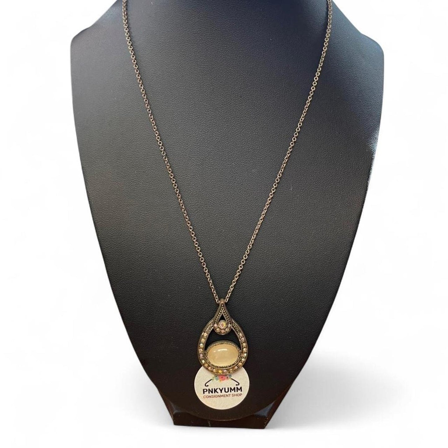 Gold and cream necklace with