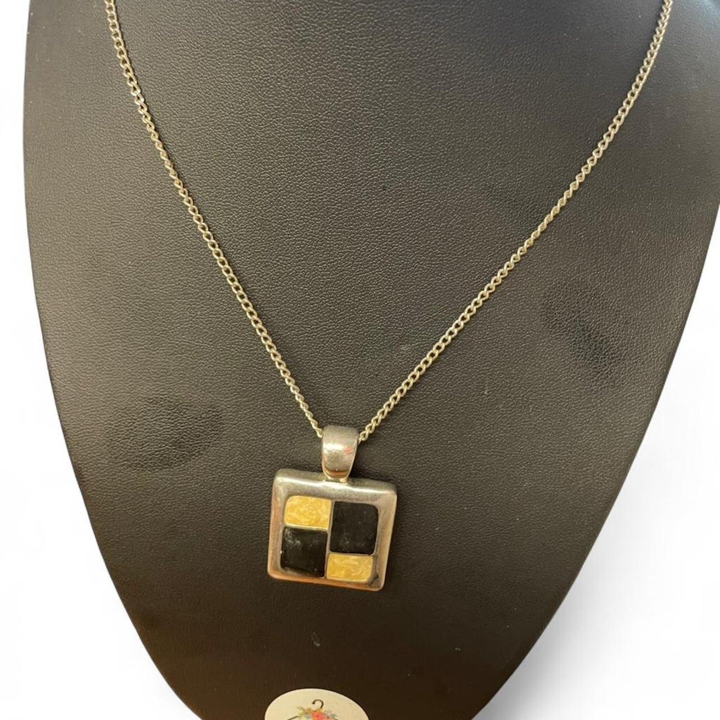 Yellow and black square pendant
