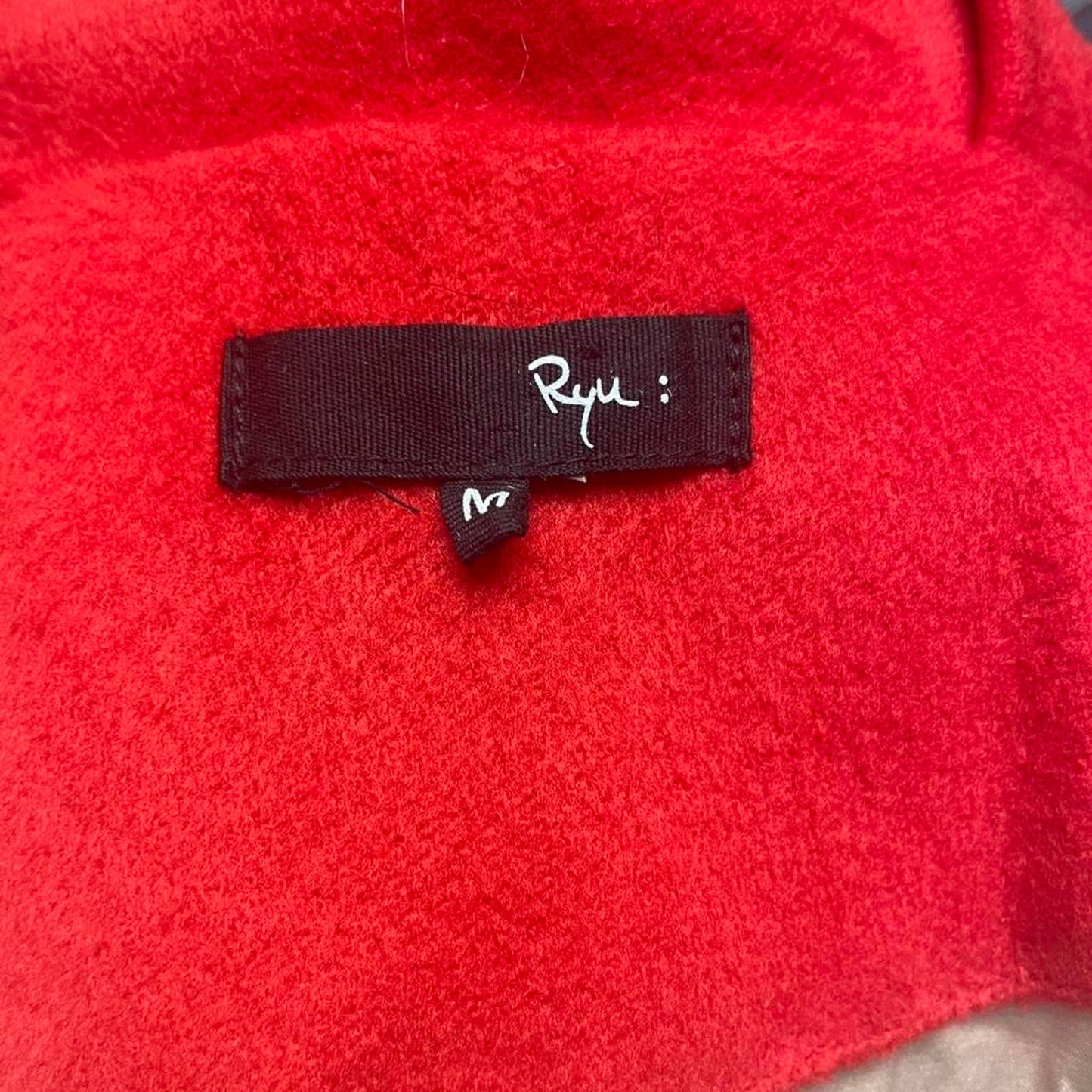 Red faux fur coat