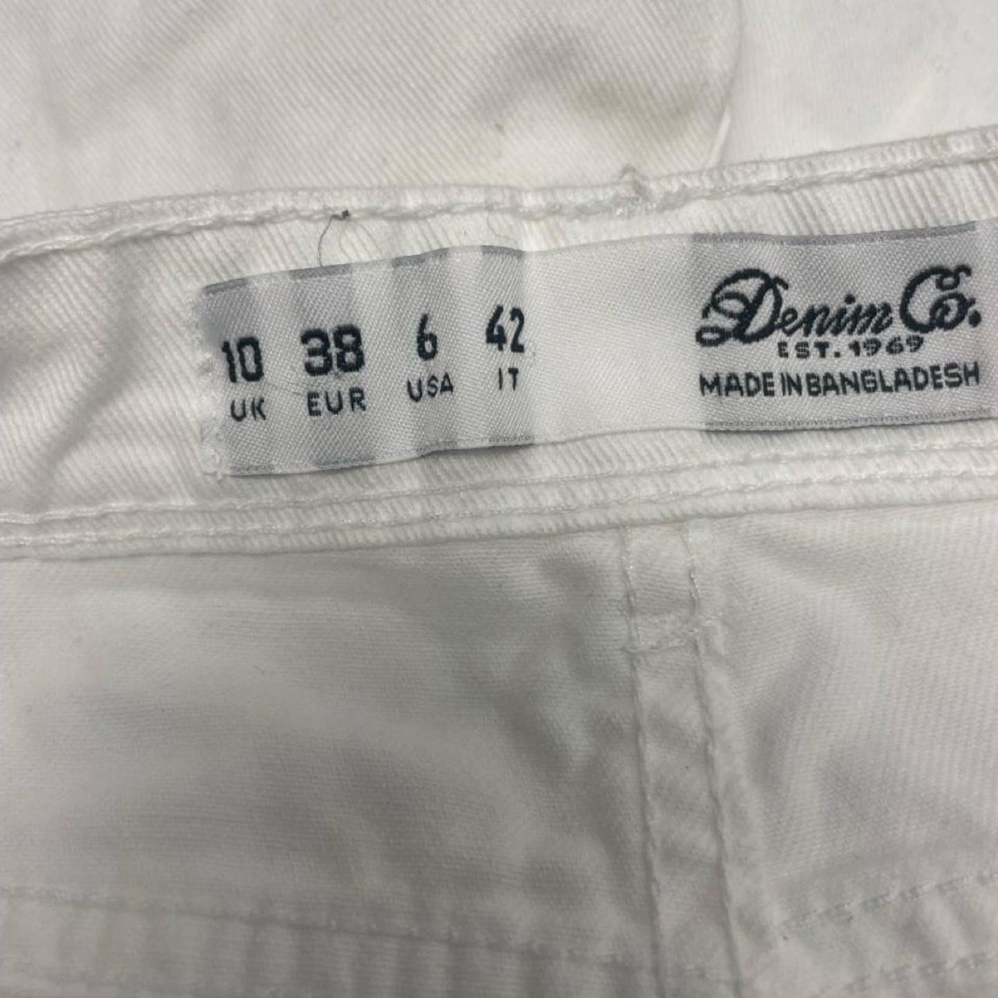White denim shorts with frayed