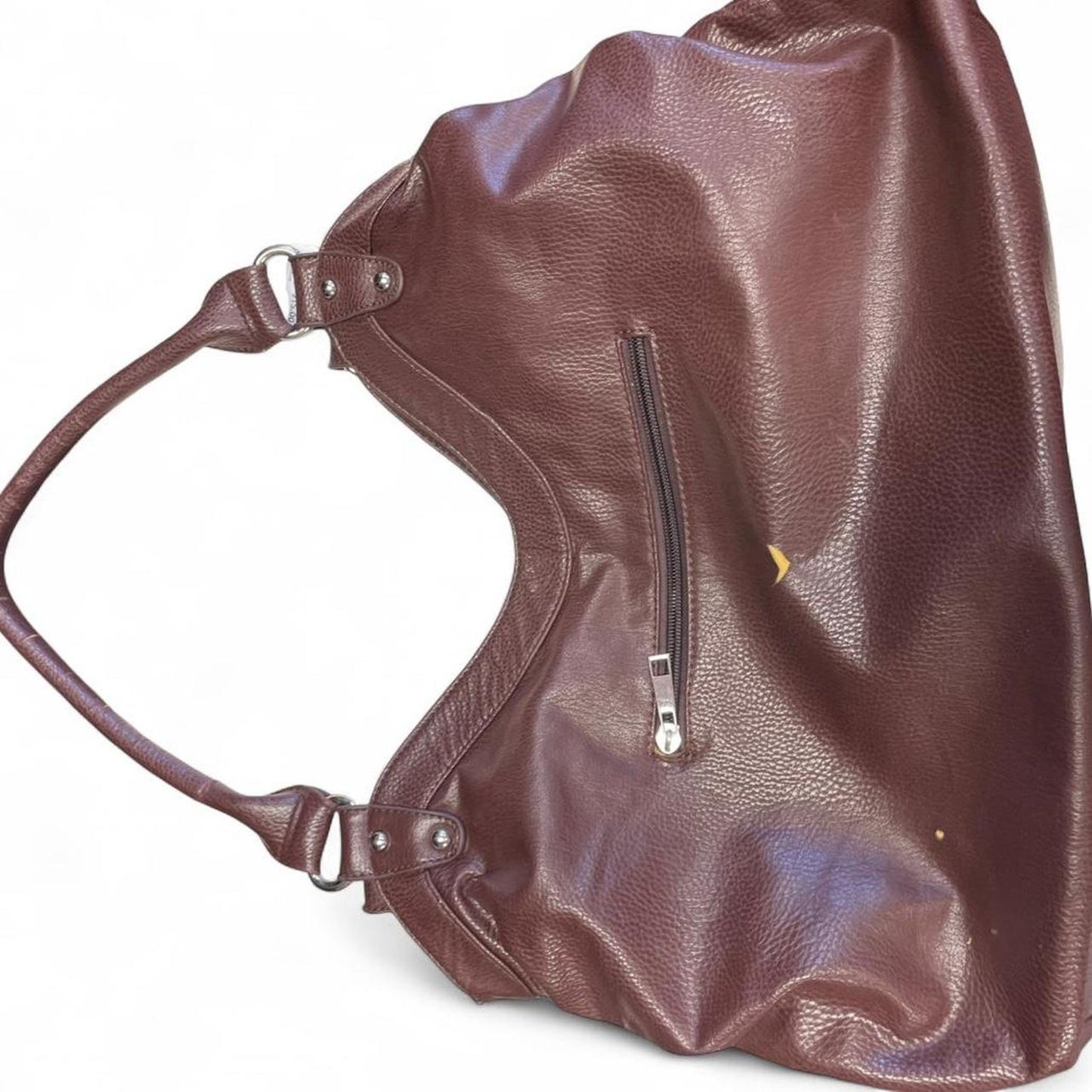 Brown leather handbag with flower