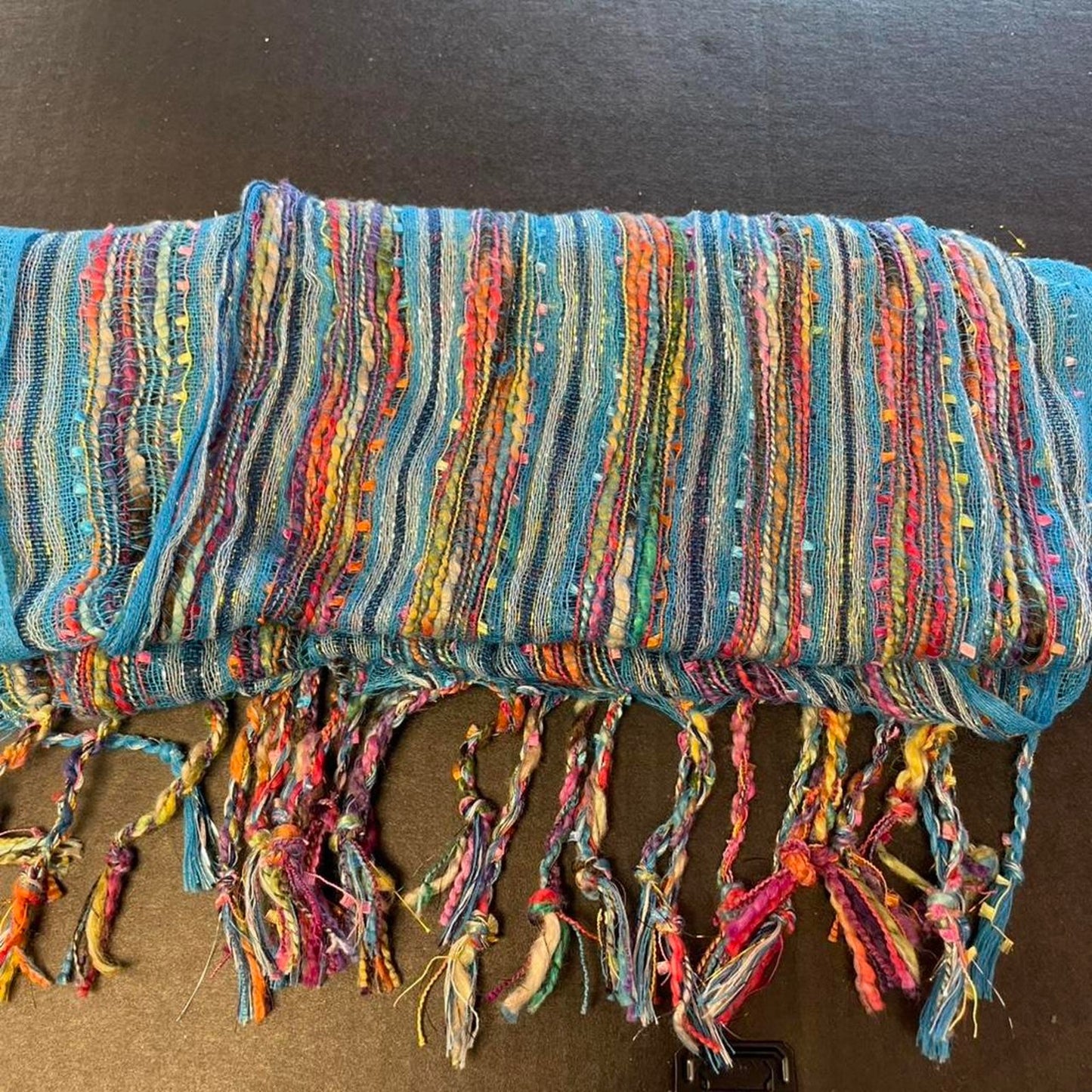 Multicoloured striped scarf with tassels