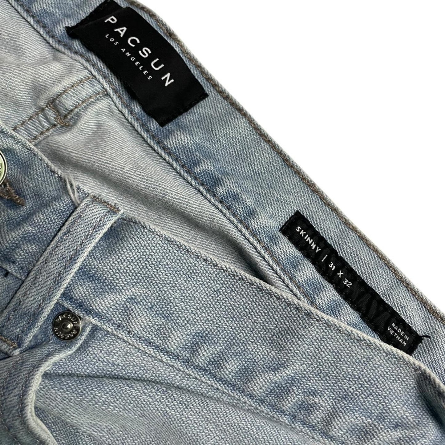 Light blue distressed ripped skinny