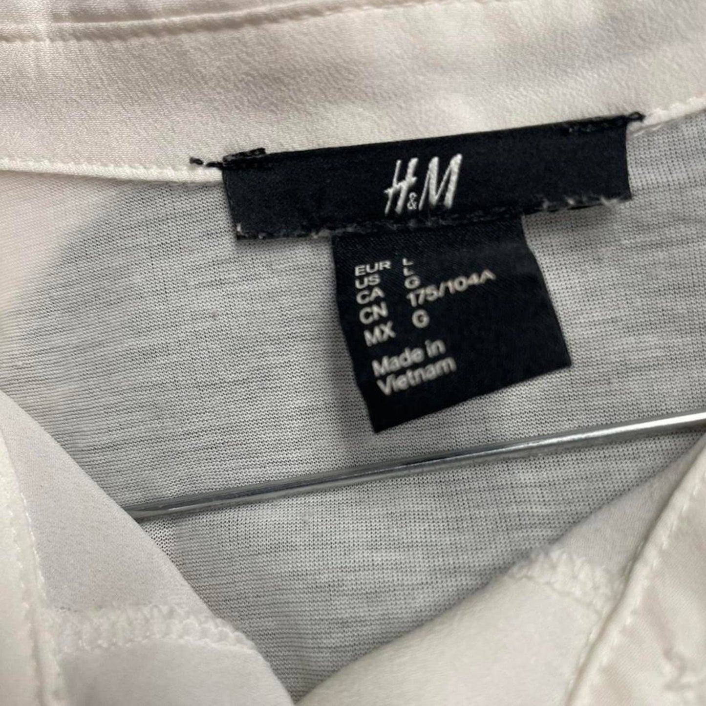 Hm white sleeveless button up