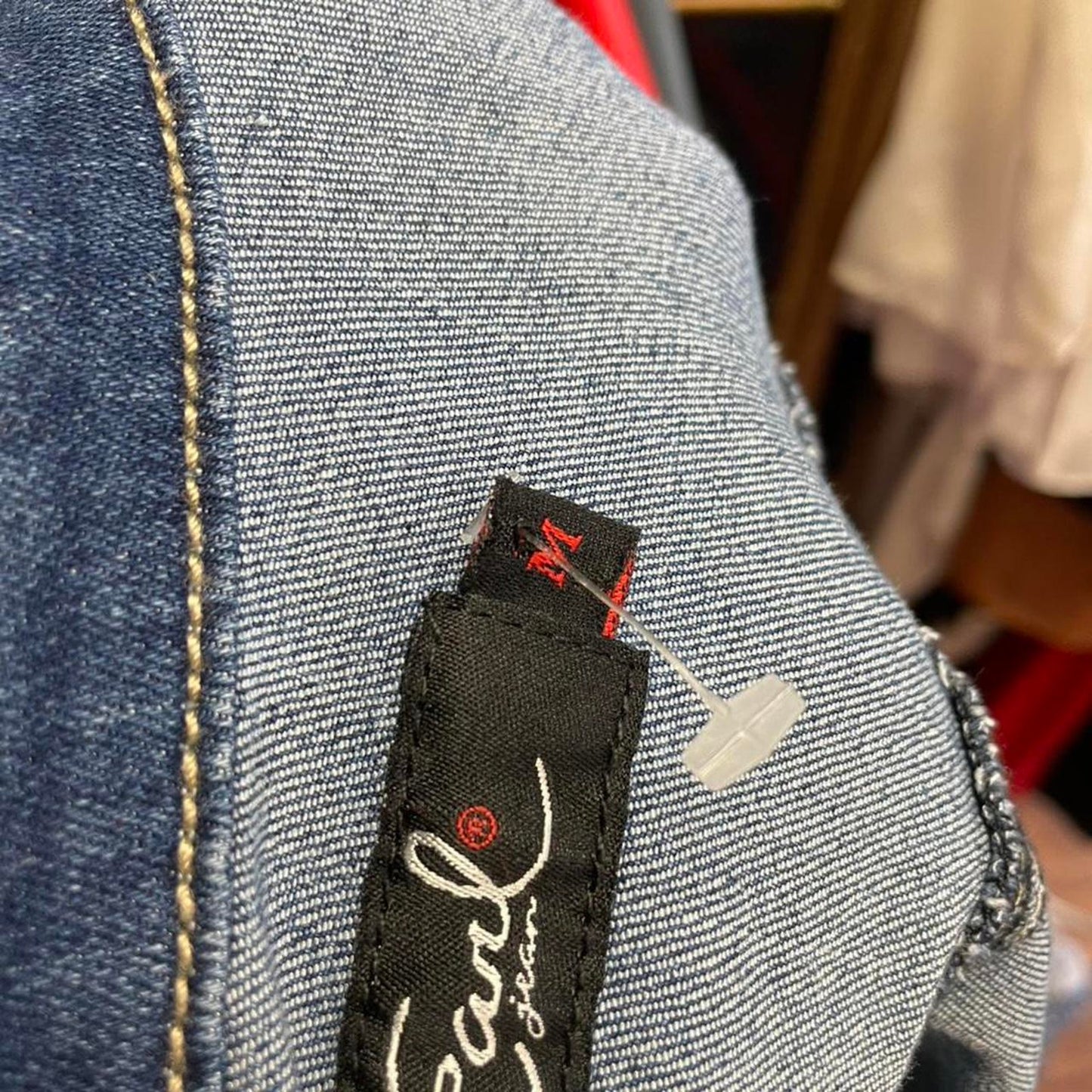 Blue denim jacket with button