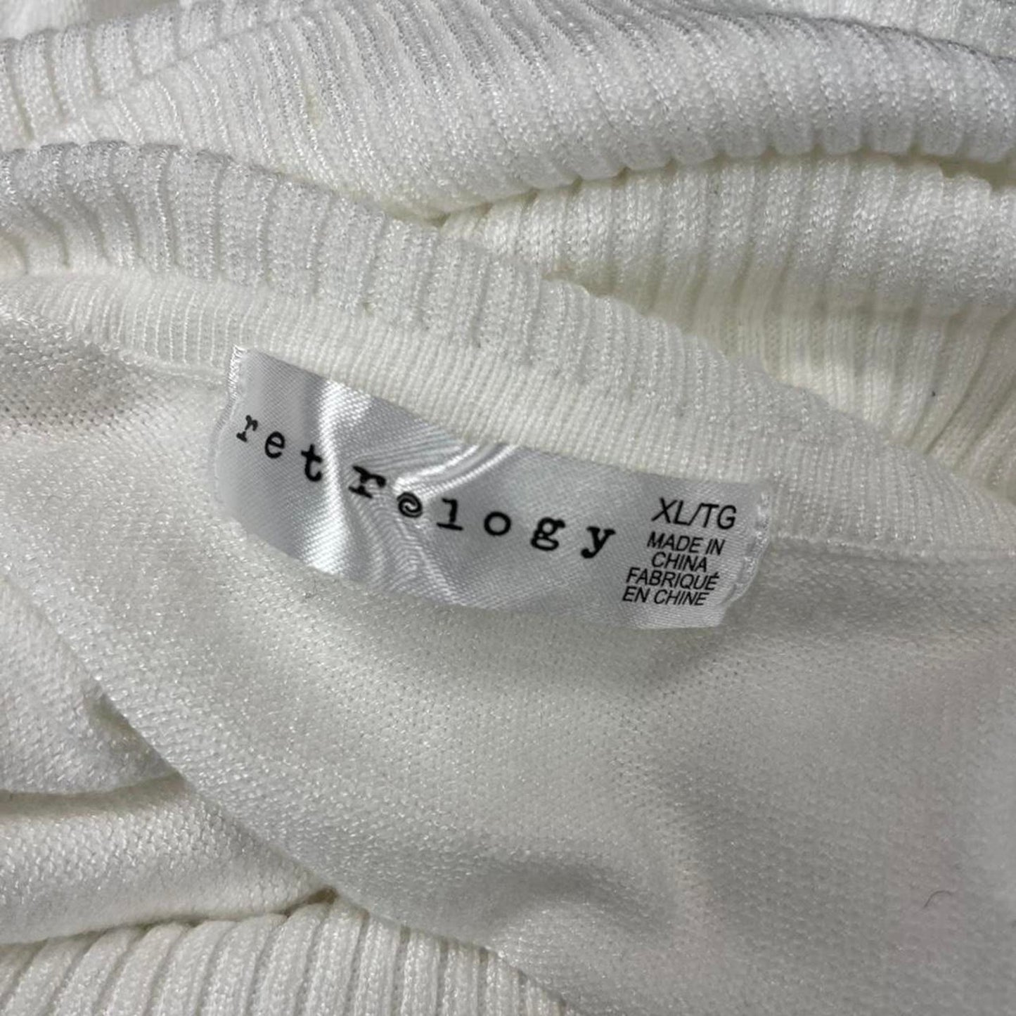 White turtleneck sweater with a