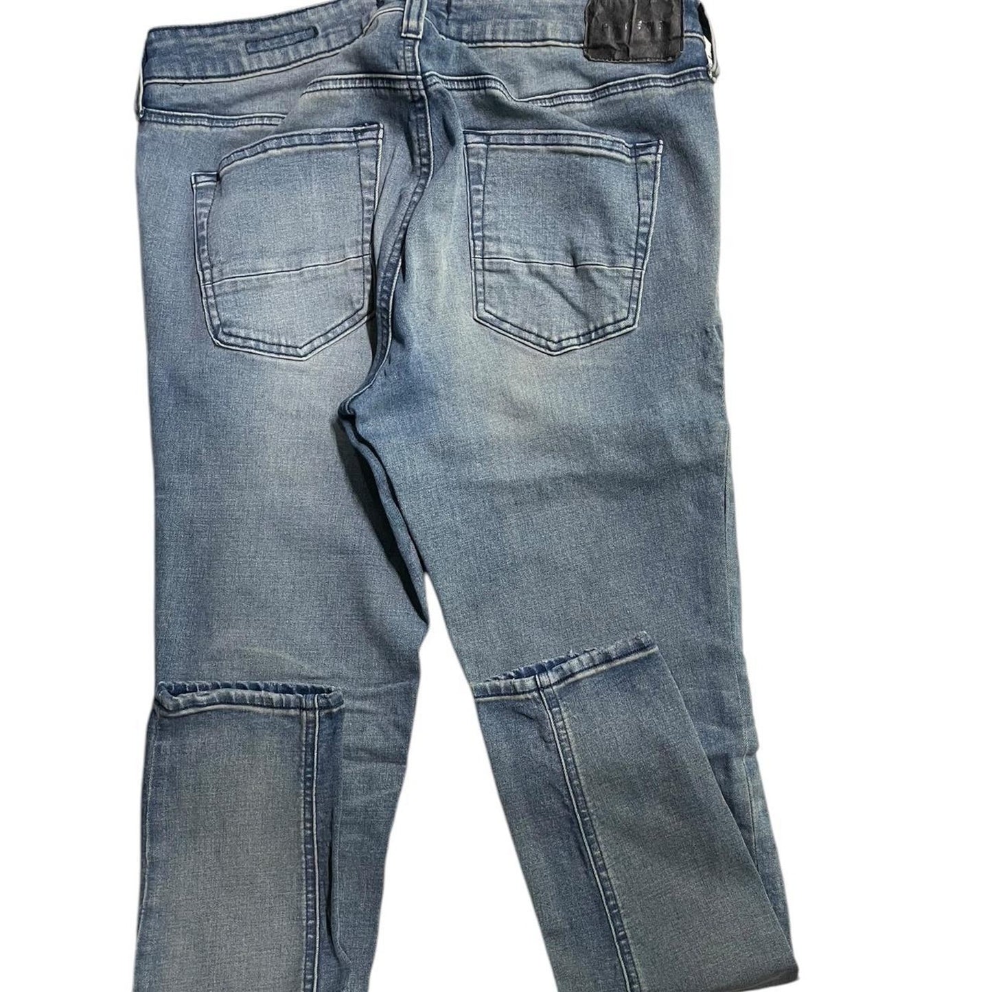 Blue distressed slim jeans distressed denim