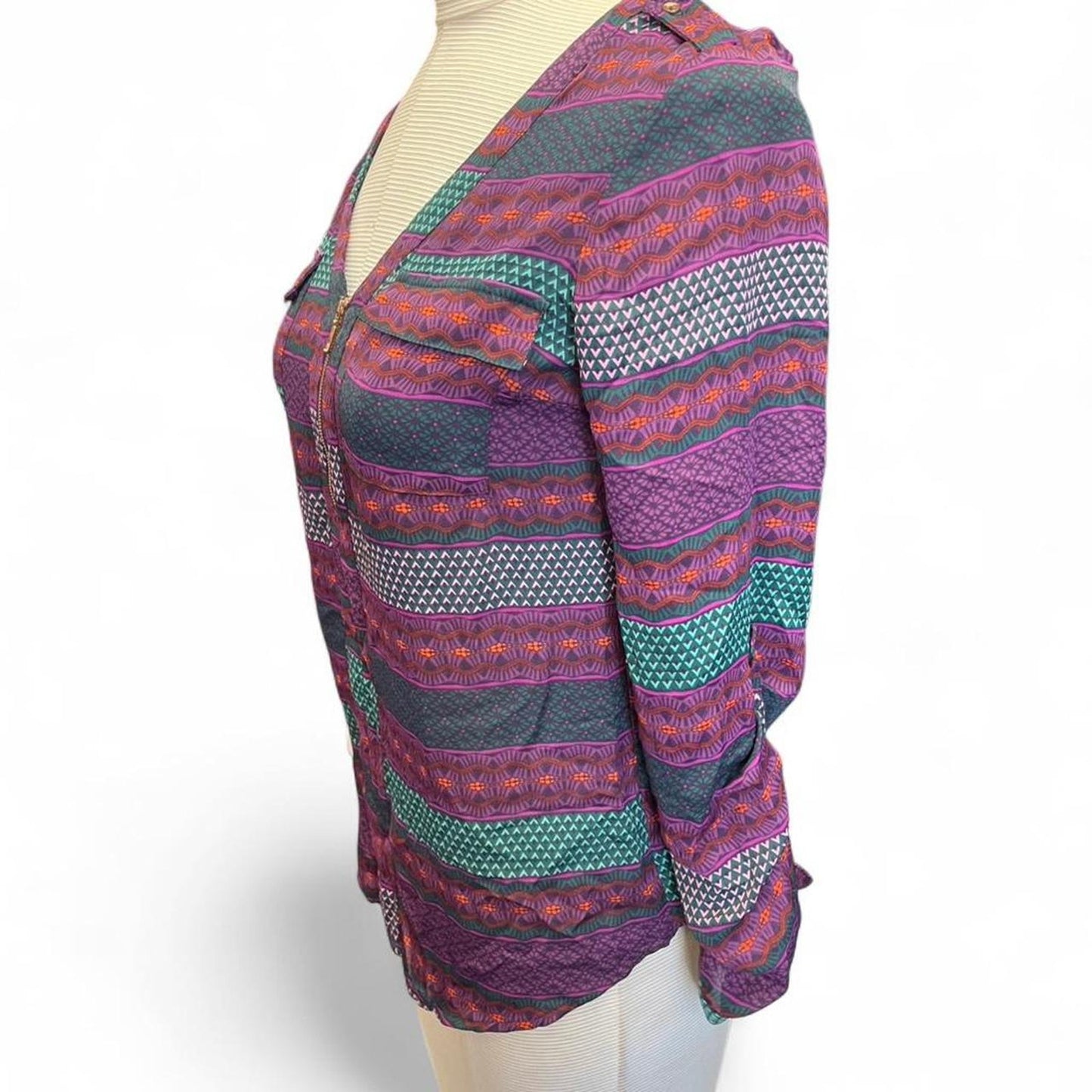 Purple and green patterned blouse
