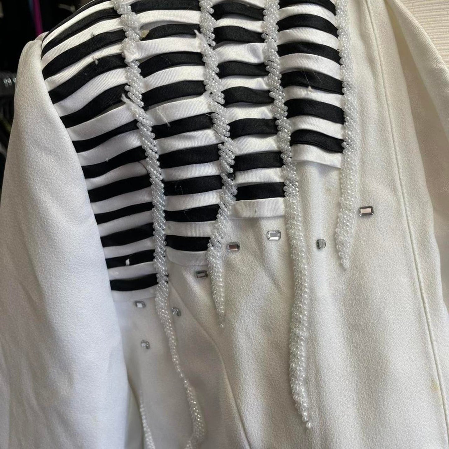 White tuxedo jacket with black