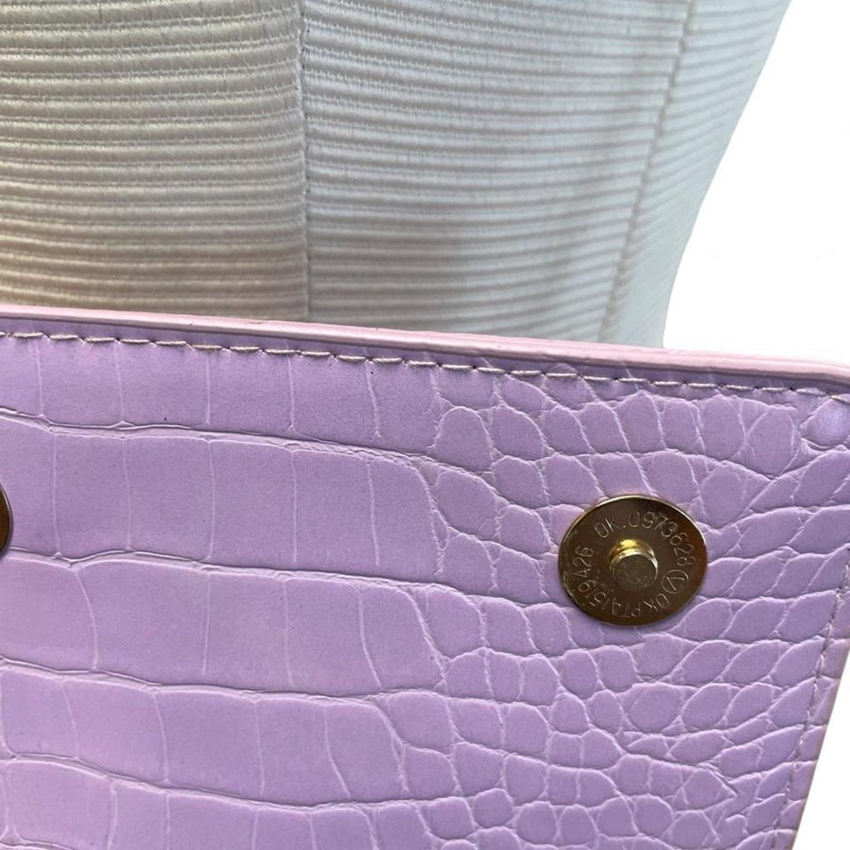 Purple crocodile textured crossbody bag