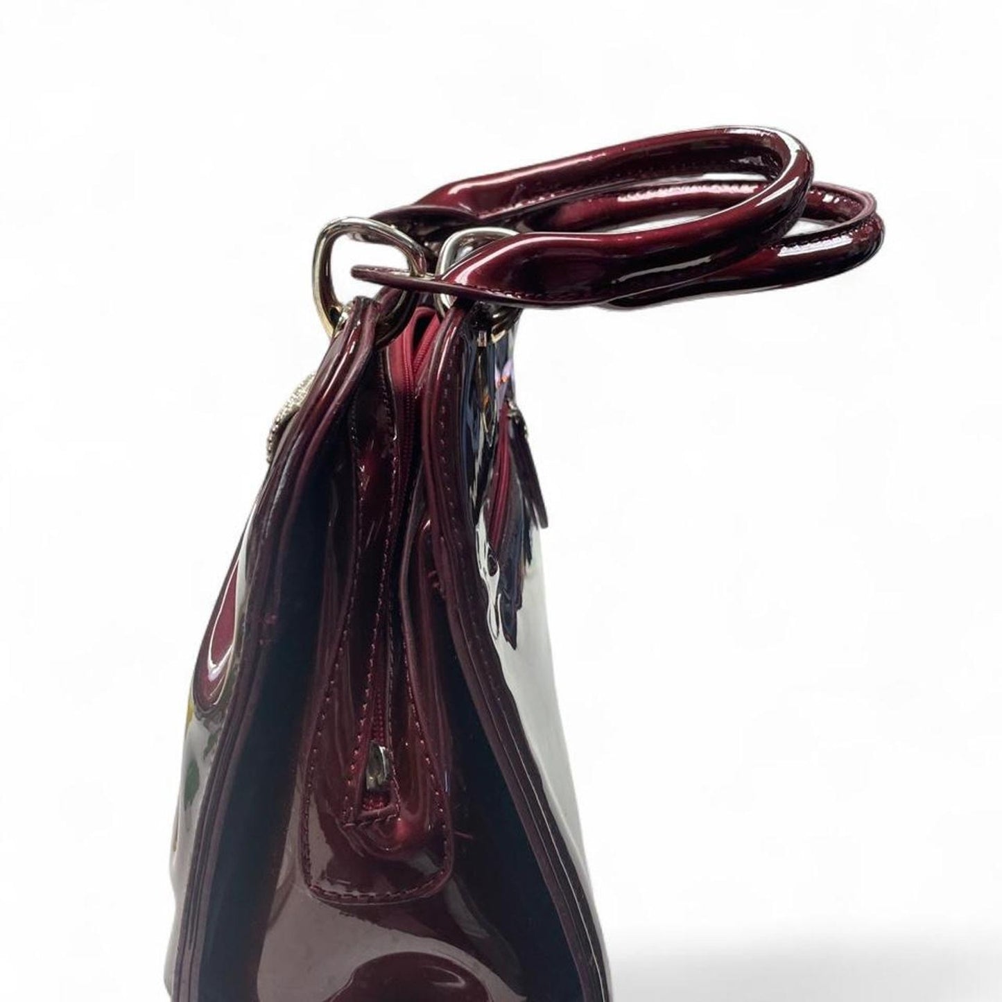 Burgundy patent leather bow handbag