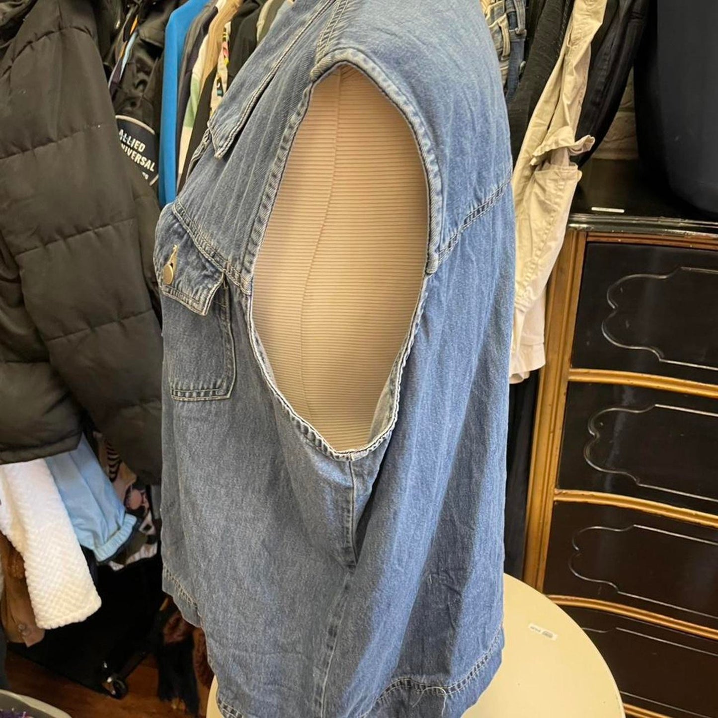 Blue denim vest with button up