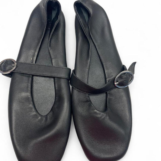 Black leather ballet flats