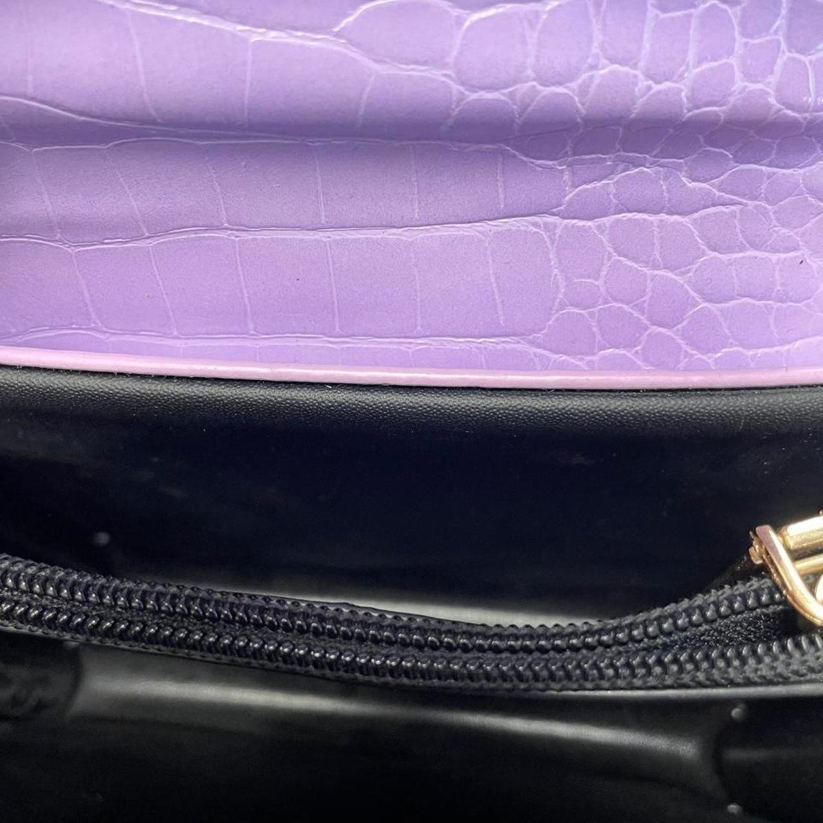 Purple crocodile textured crossbody bag