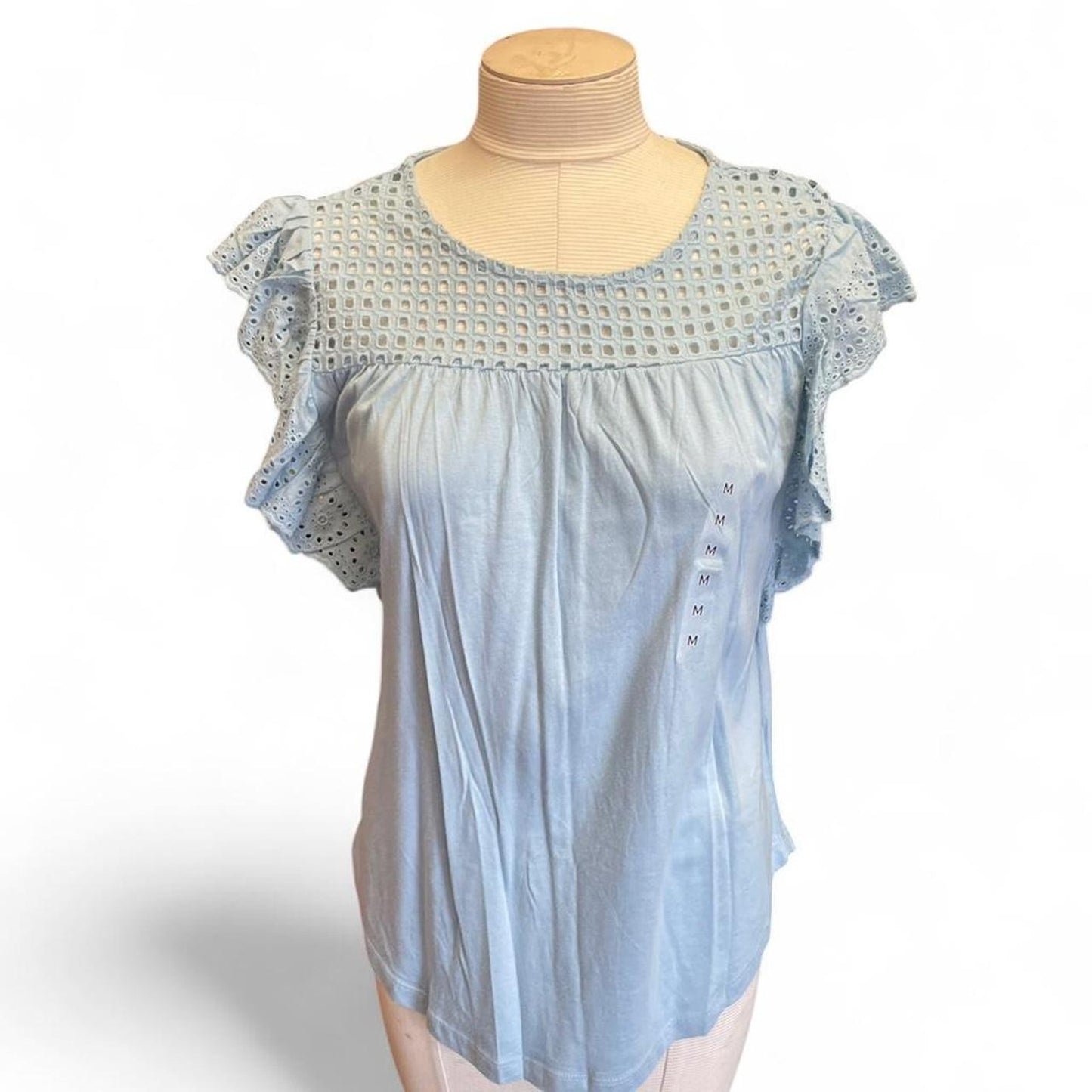 Light blue eyelet blouse with