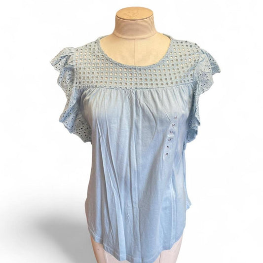 Light blue eyelet blouse with