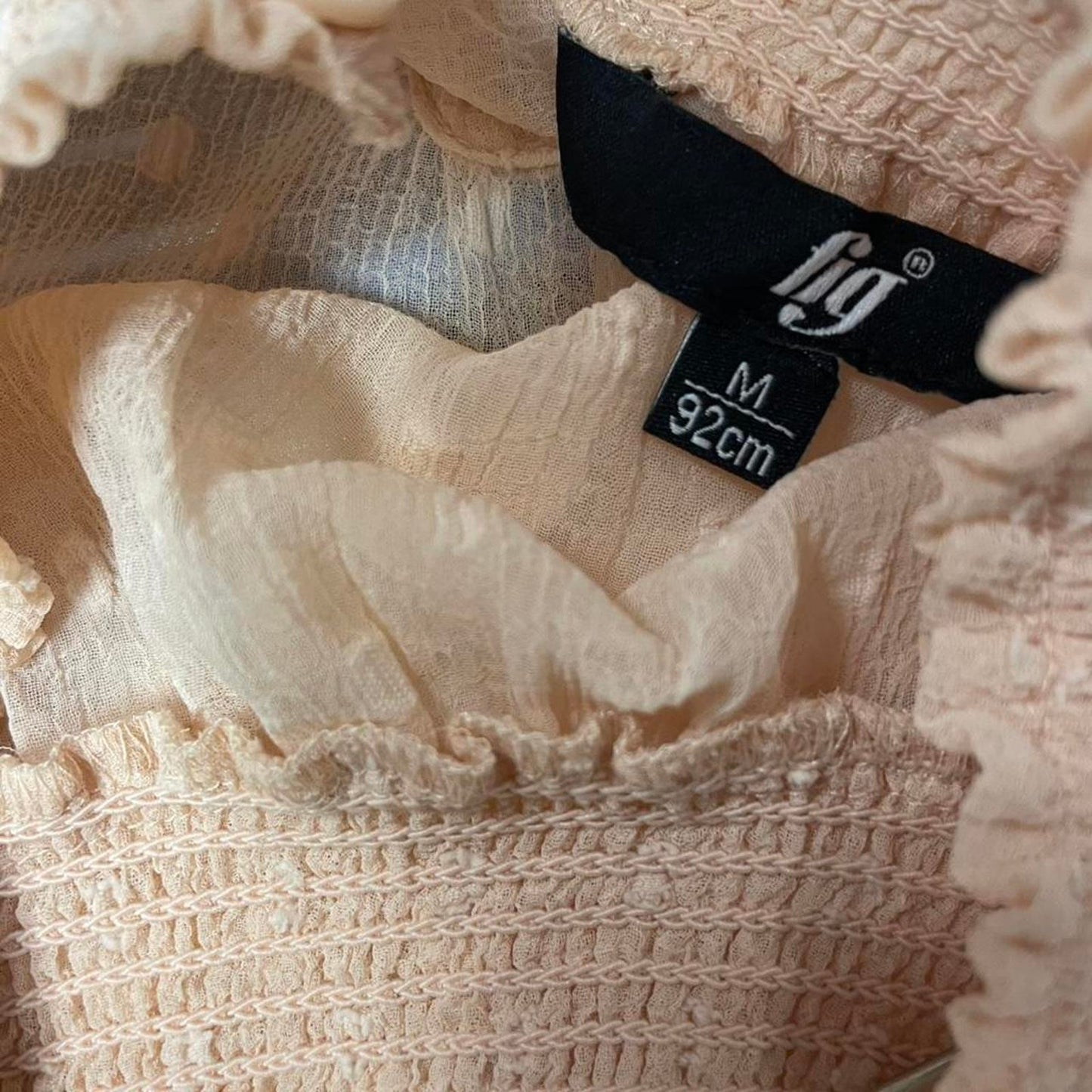 Fig pink blouse with ruffle