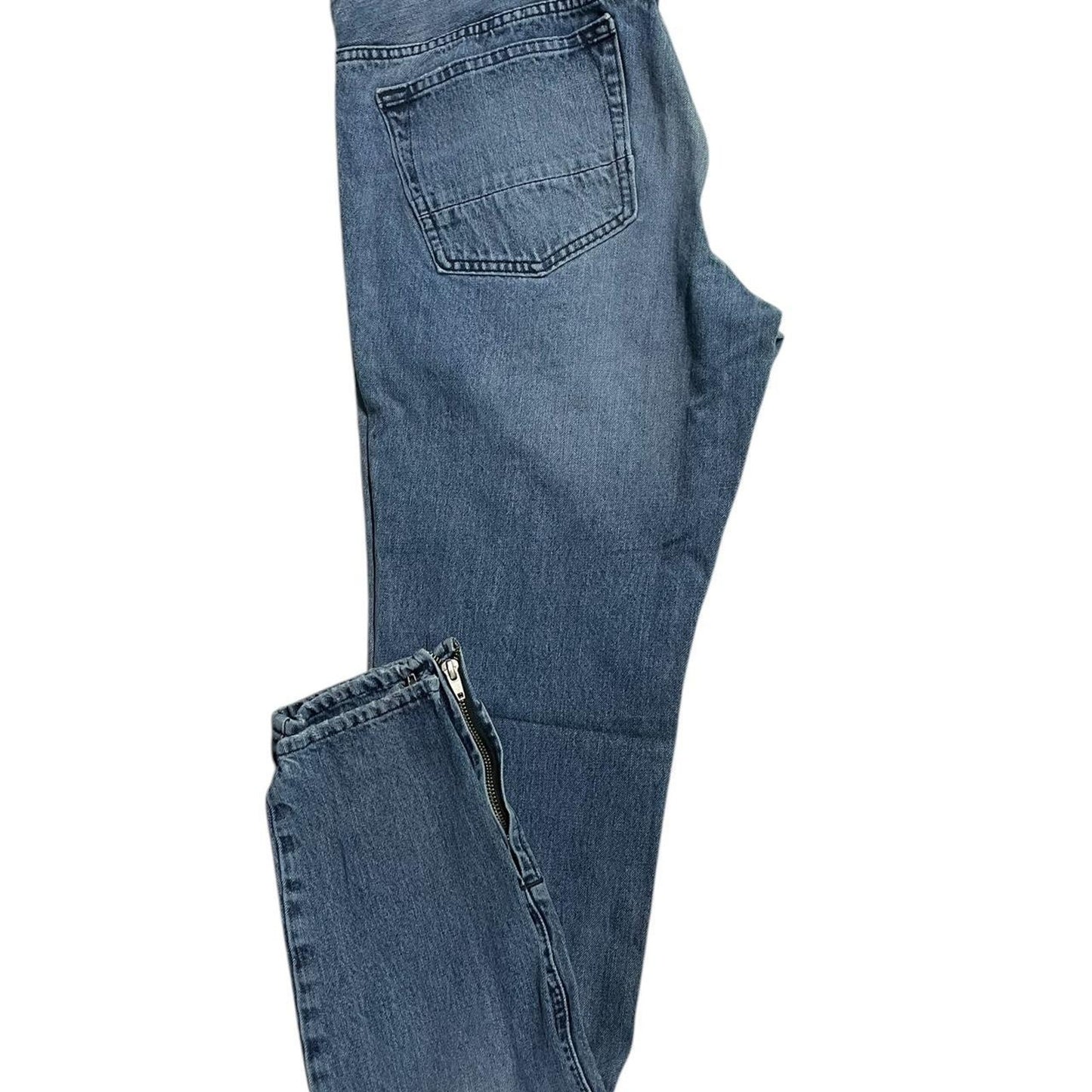 Distressed blue denim jeans