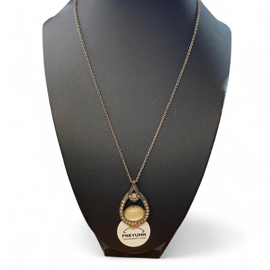 Gold and cream necklace with