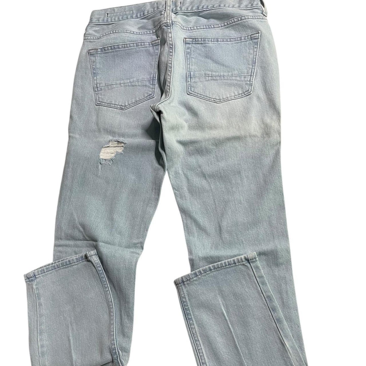Light blue distressed ripped skinny