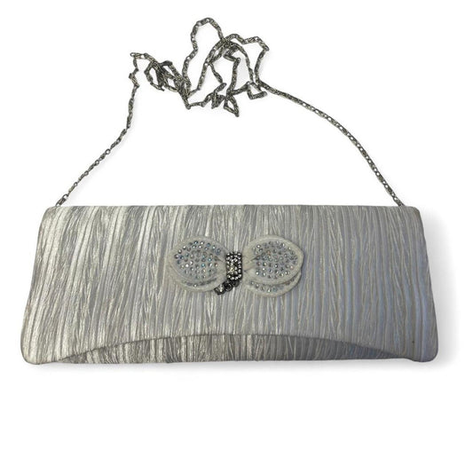 Silver clutch with rhinestone butterfly