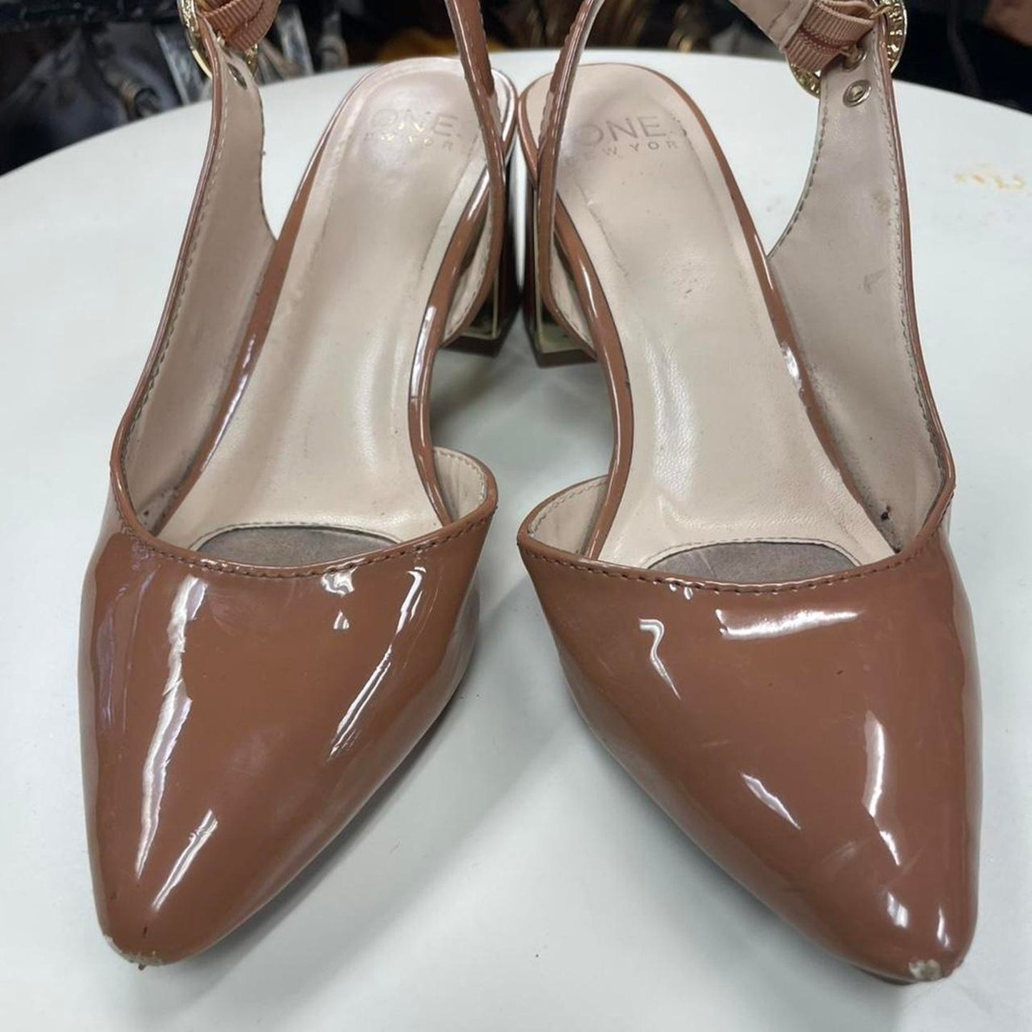 Tan patent leather slingback heels