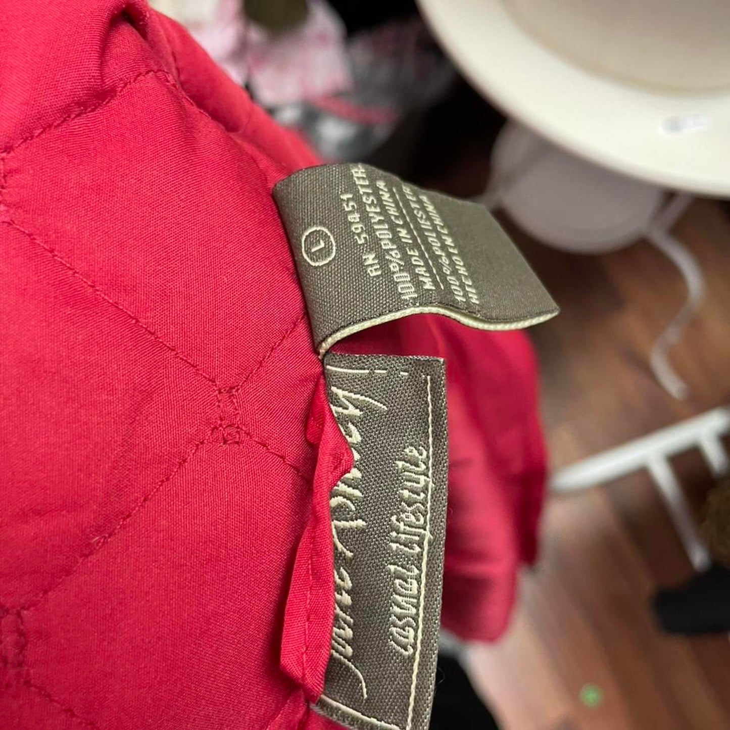 Red quilted jacket with zipper