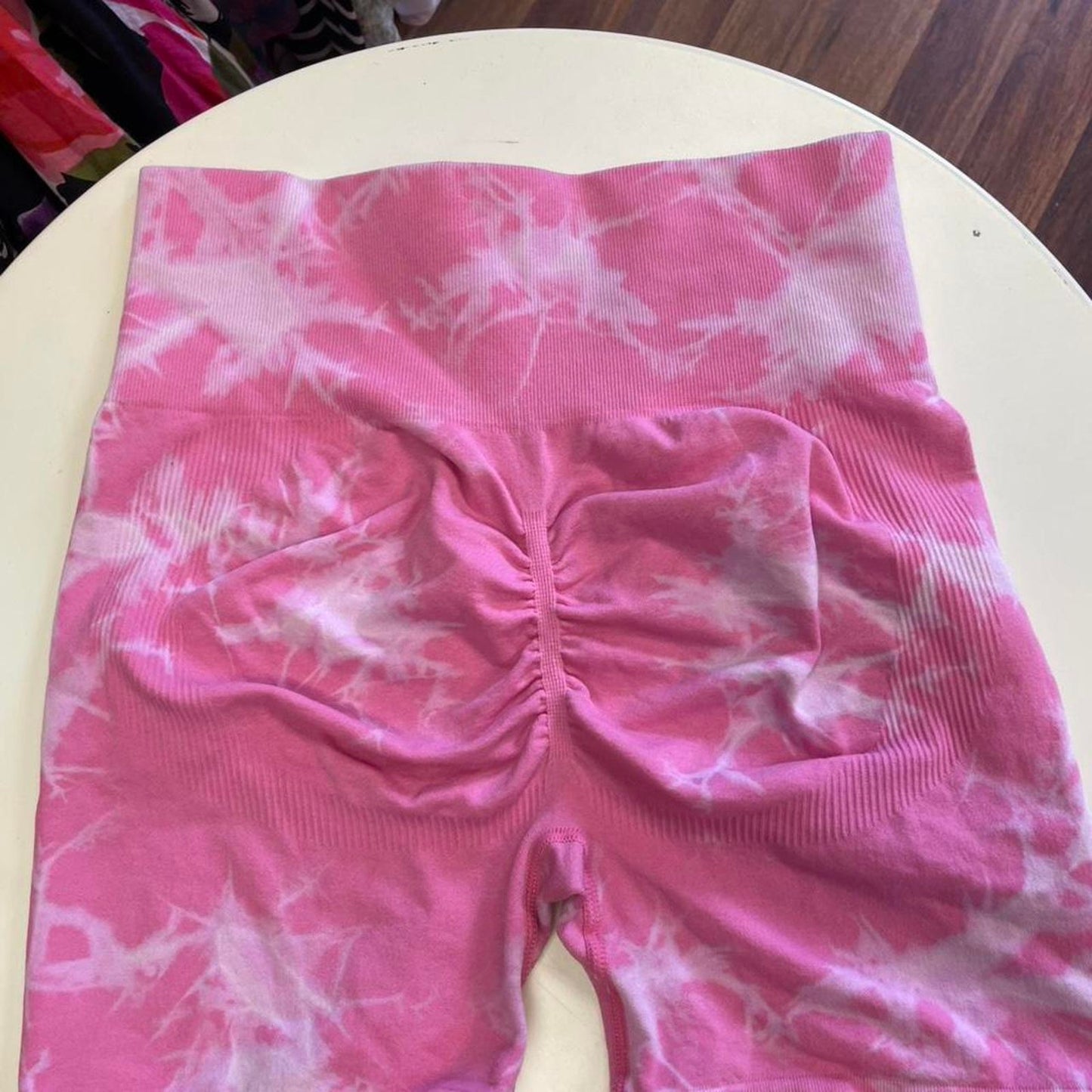Pink tie dye sports bra and