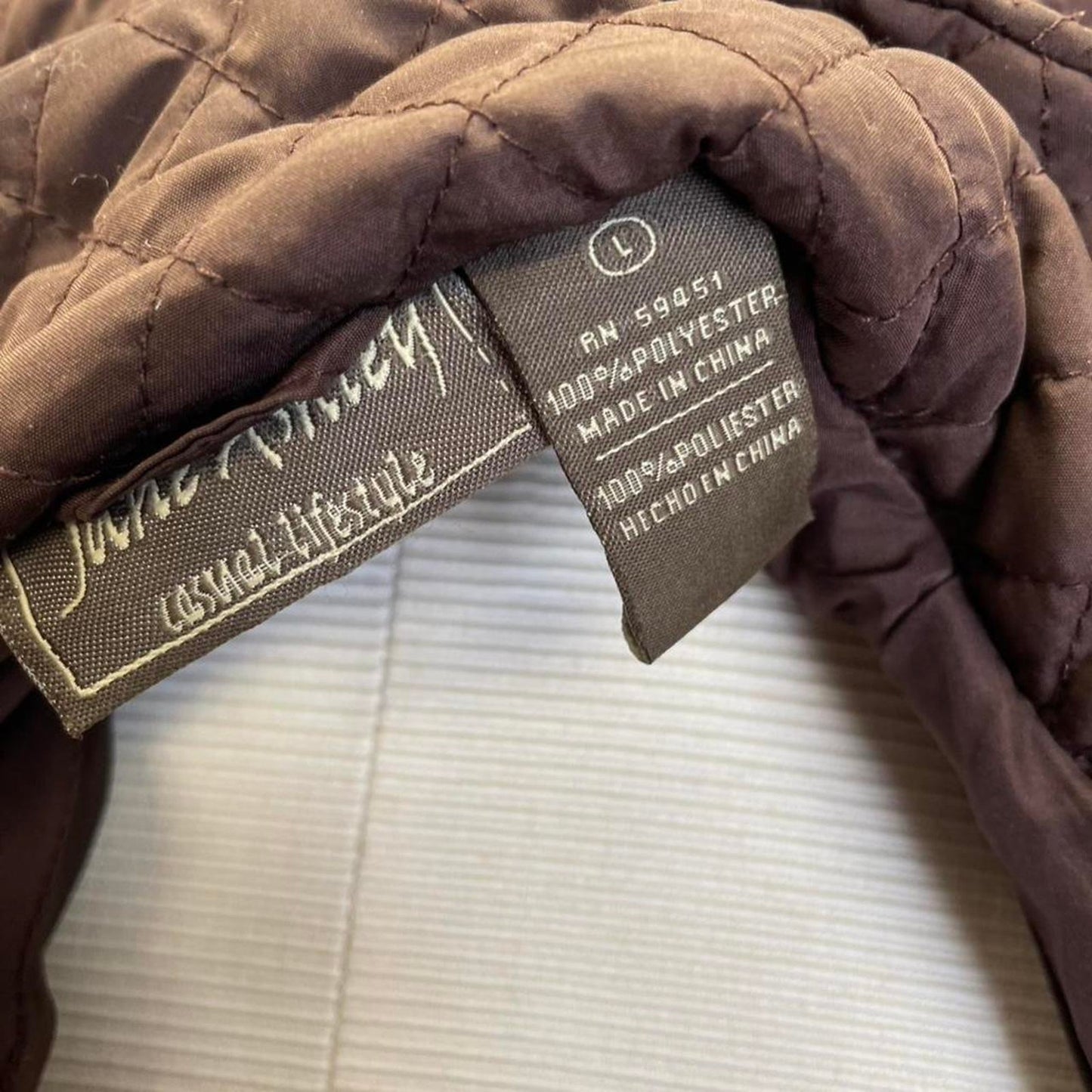 Brown quilted zip up jacket
