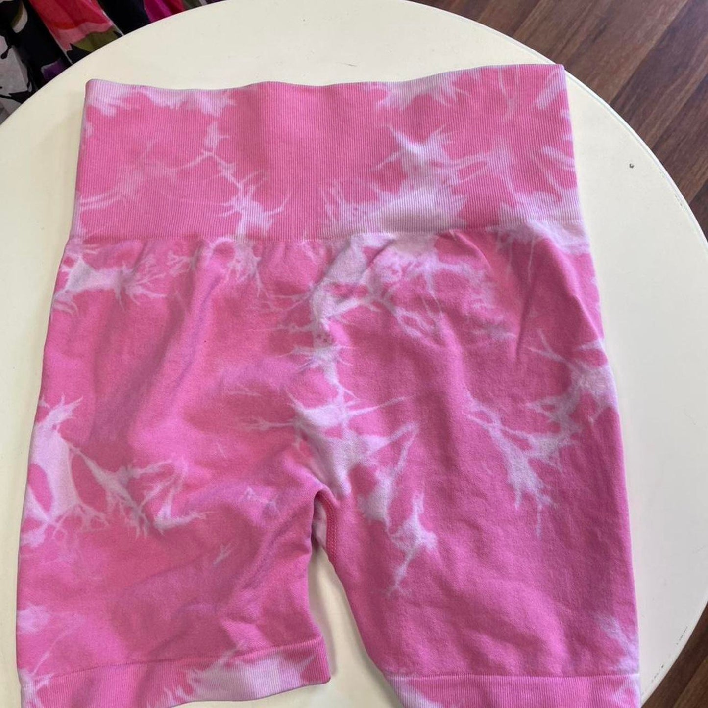 Pink tie dye sports bra and