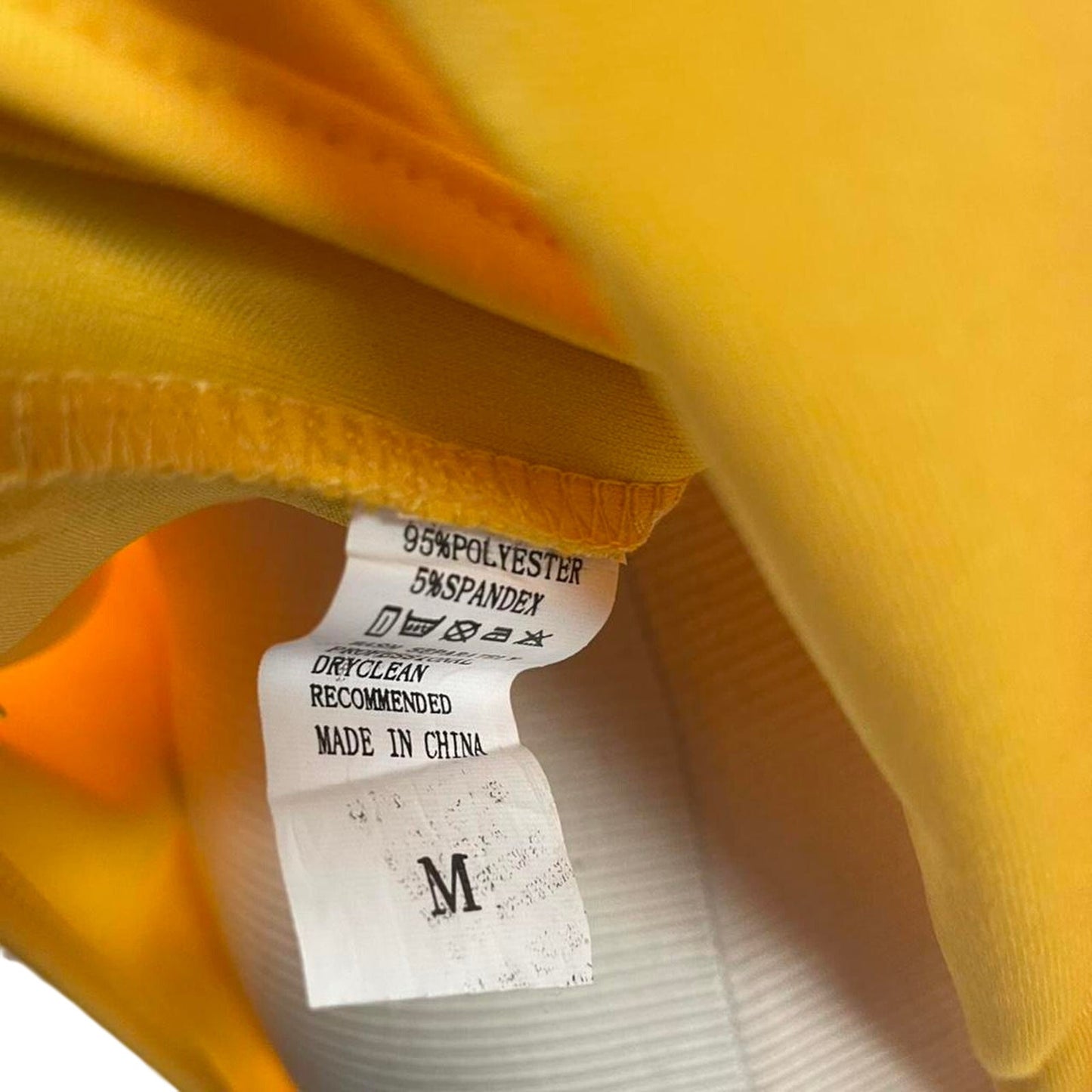 Yellow long sleeve bodysuit