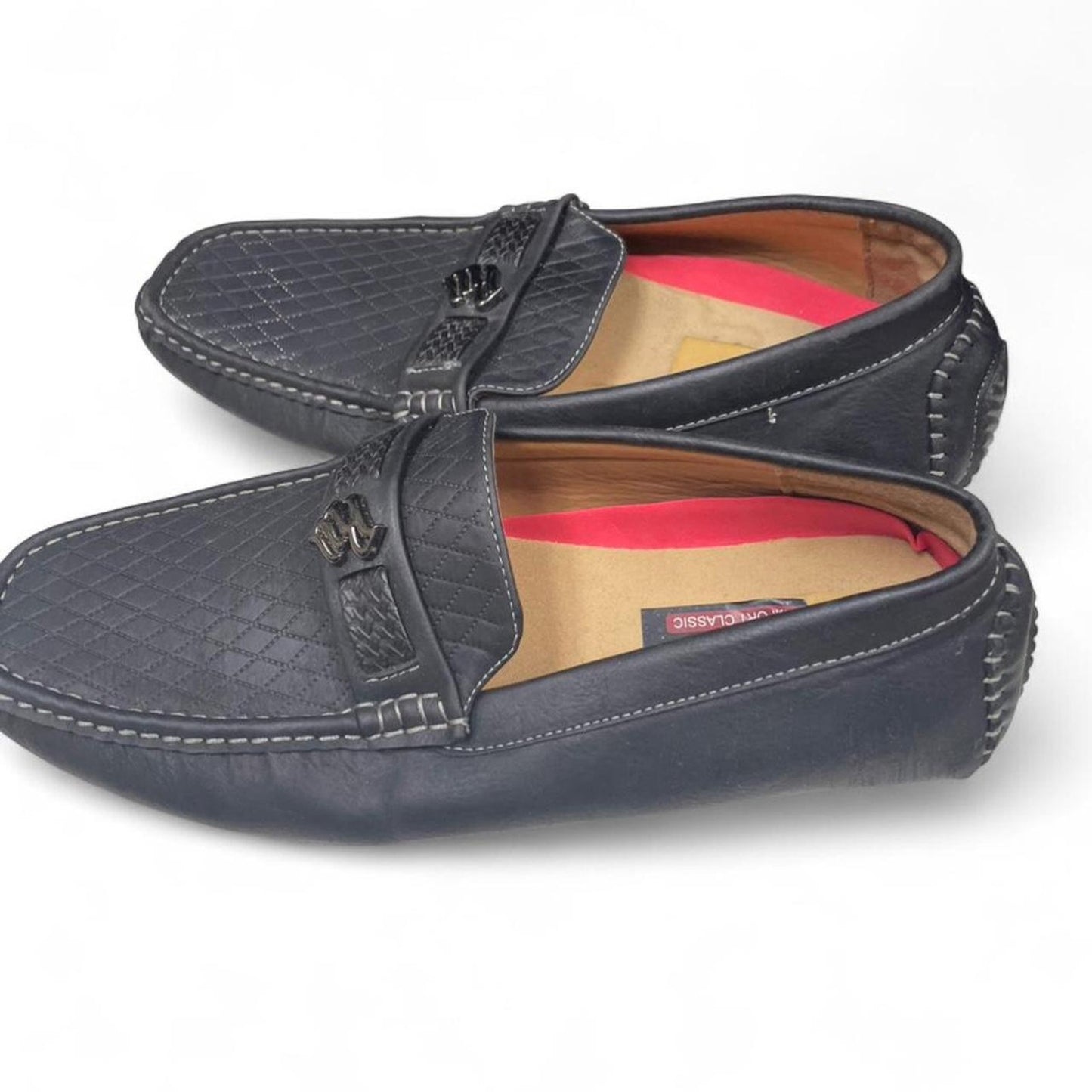 Black leather loafers with silver