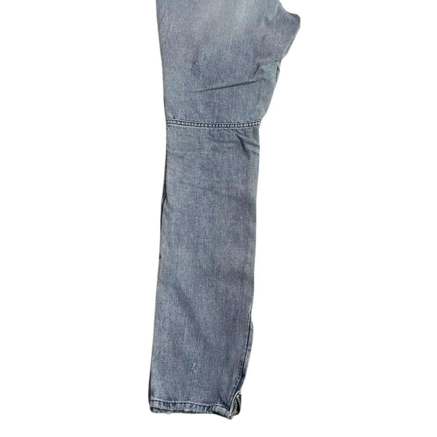 Distressed blue ripped jeans