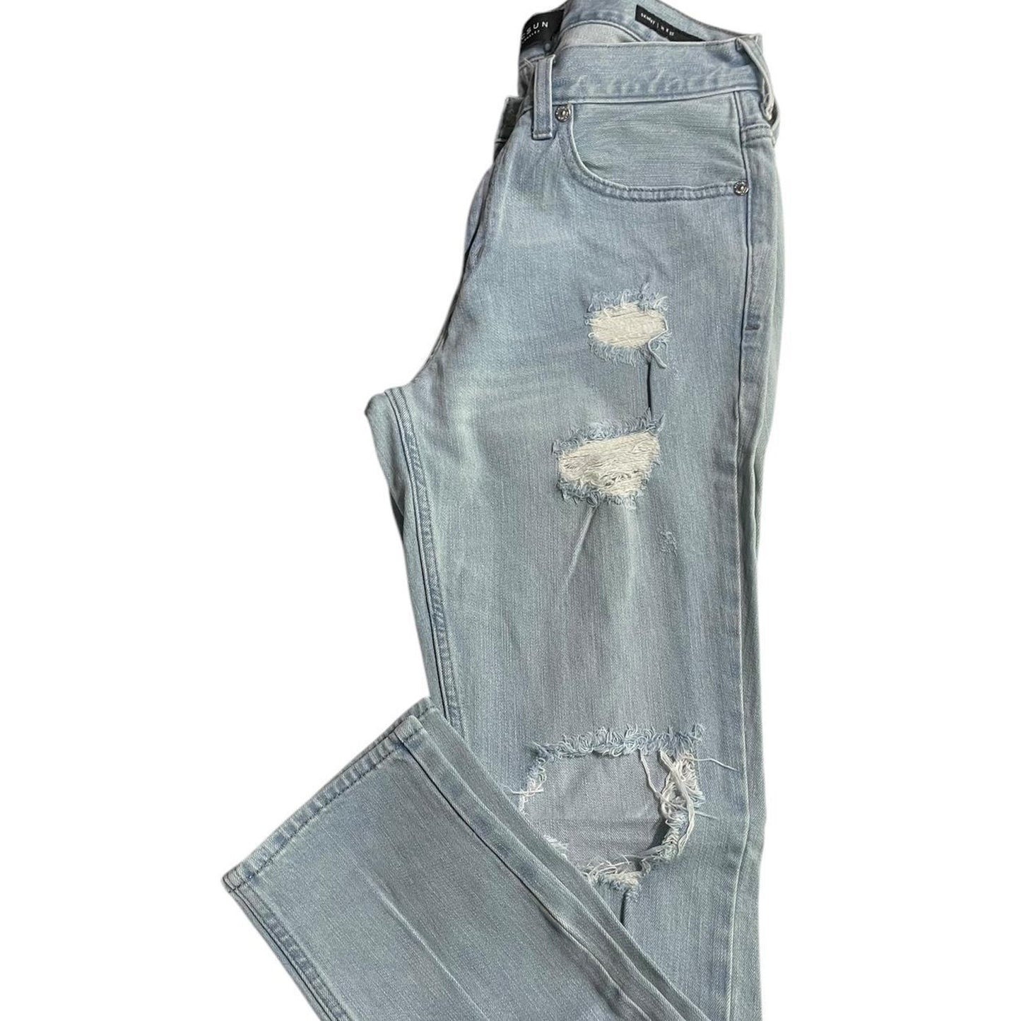 Light blue distressed ripped skinny