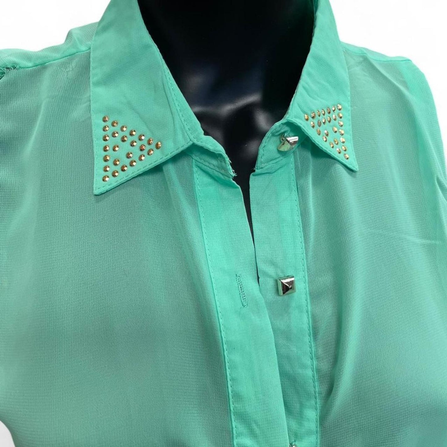 Green sleeveless button up blouse