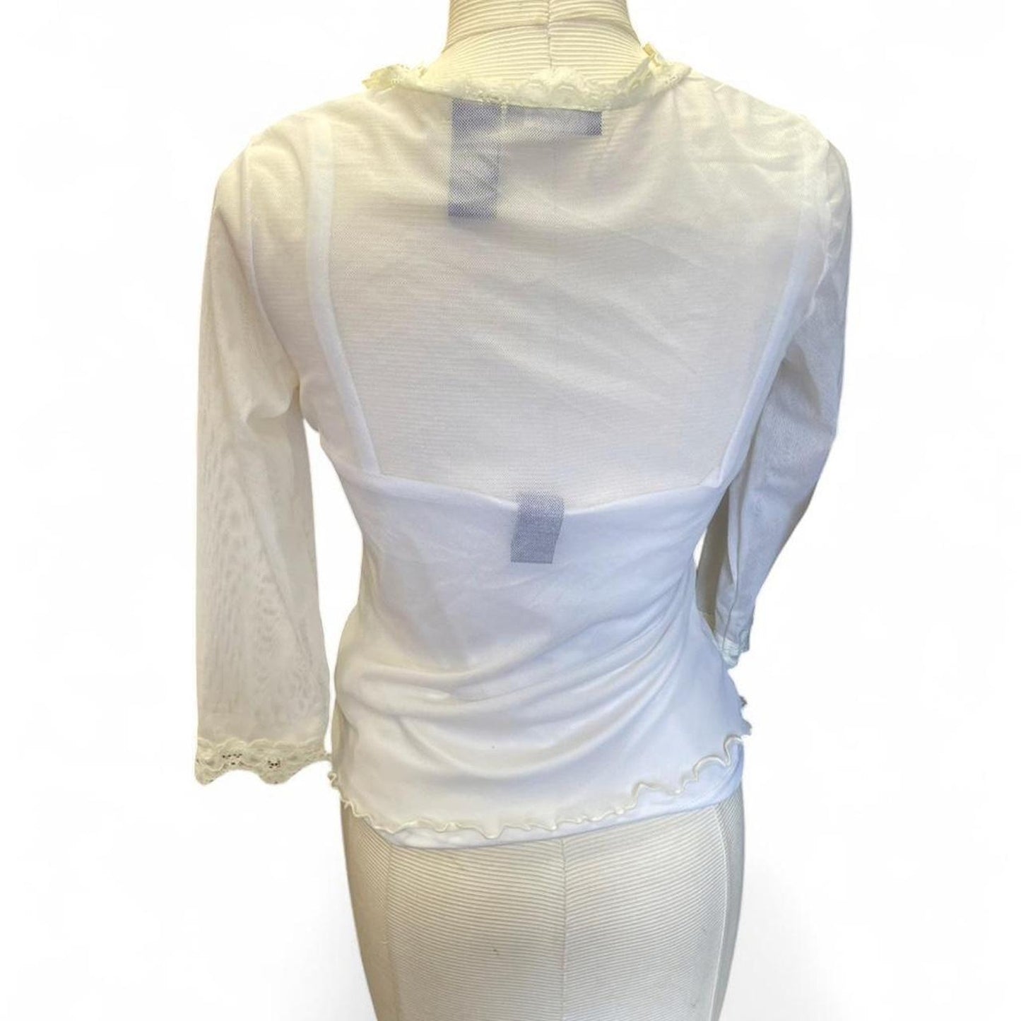 White lace blouse with ruffle