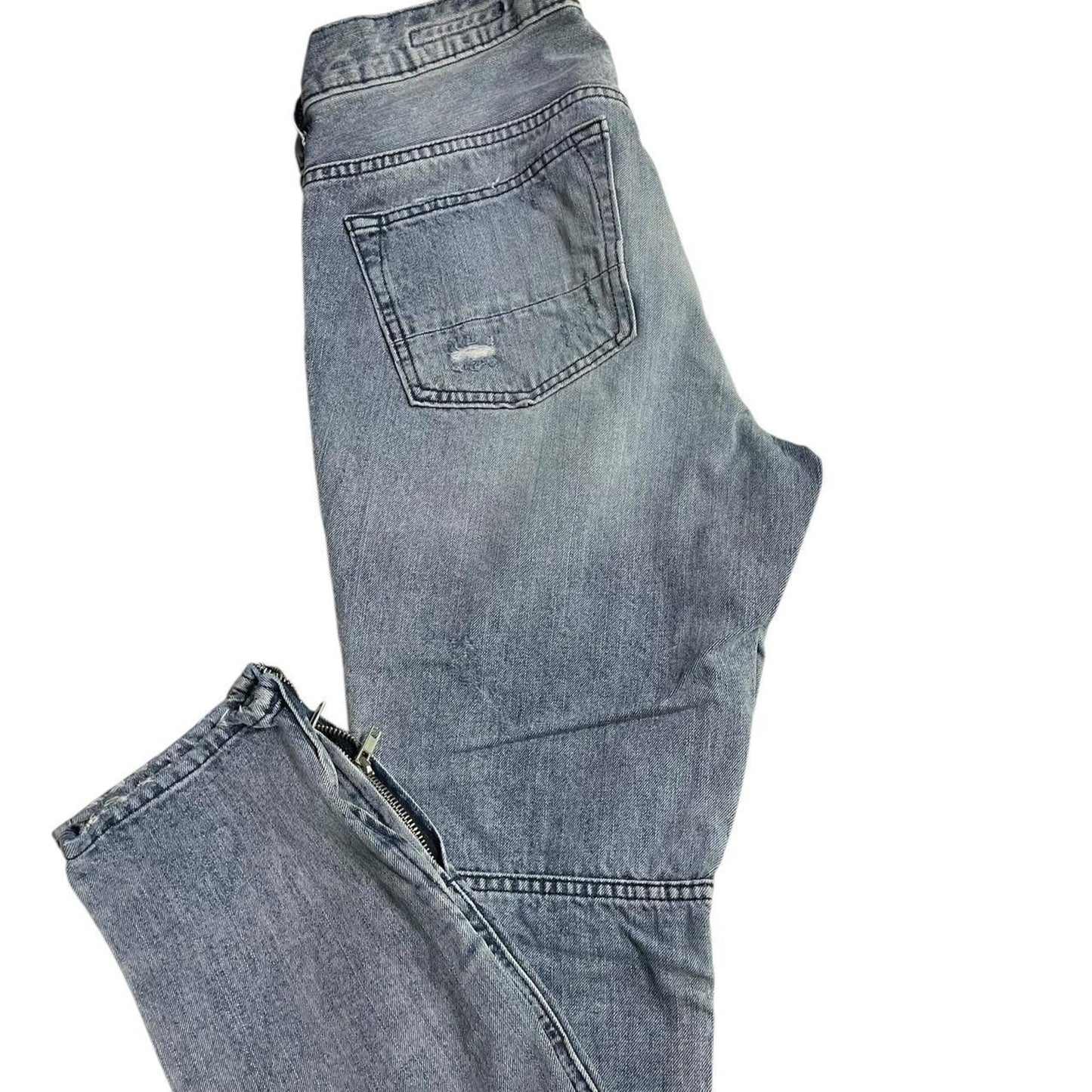 Distressed blue ripped jeans