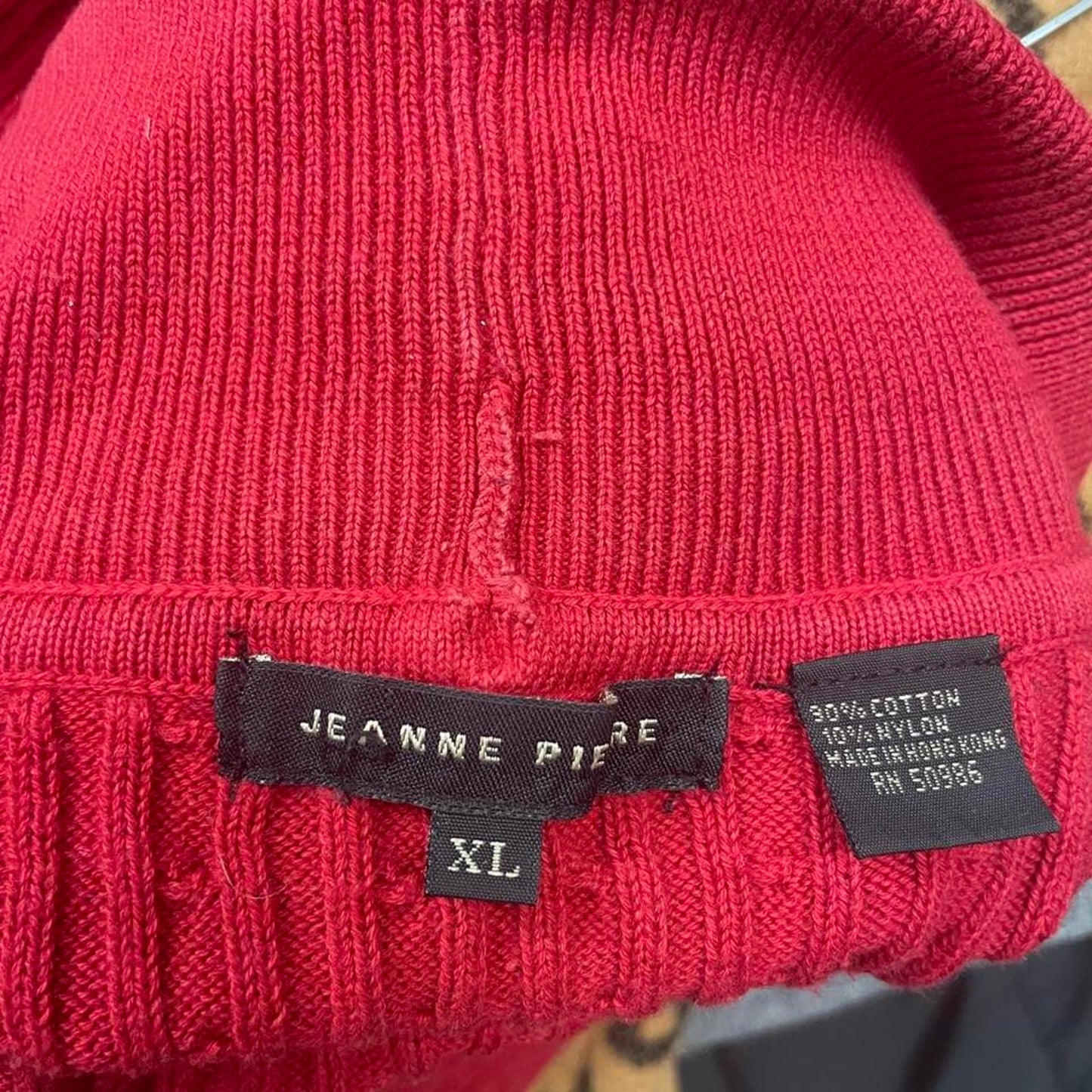 Red cable knit turtleneck sweater