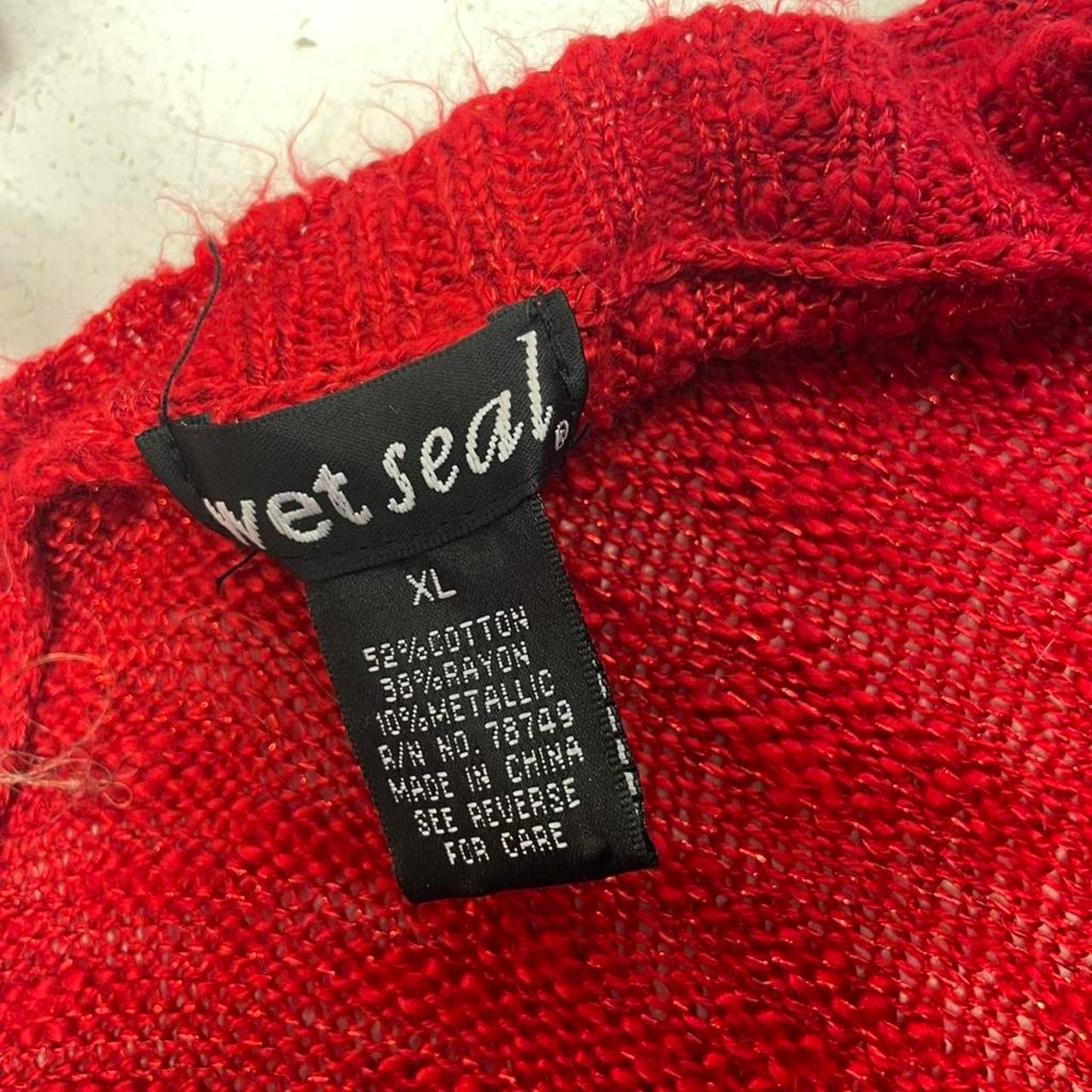 Red metallic knit sweater
