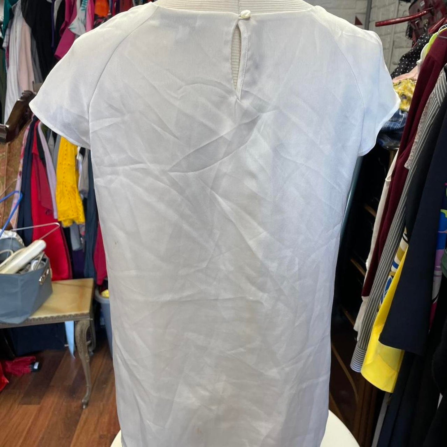 White sheer blouse with black