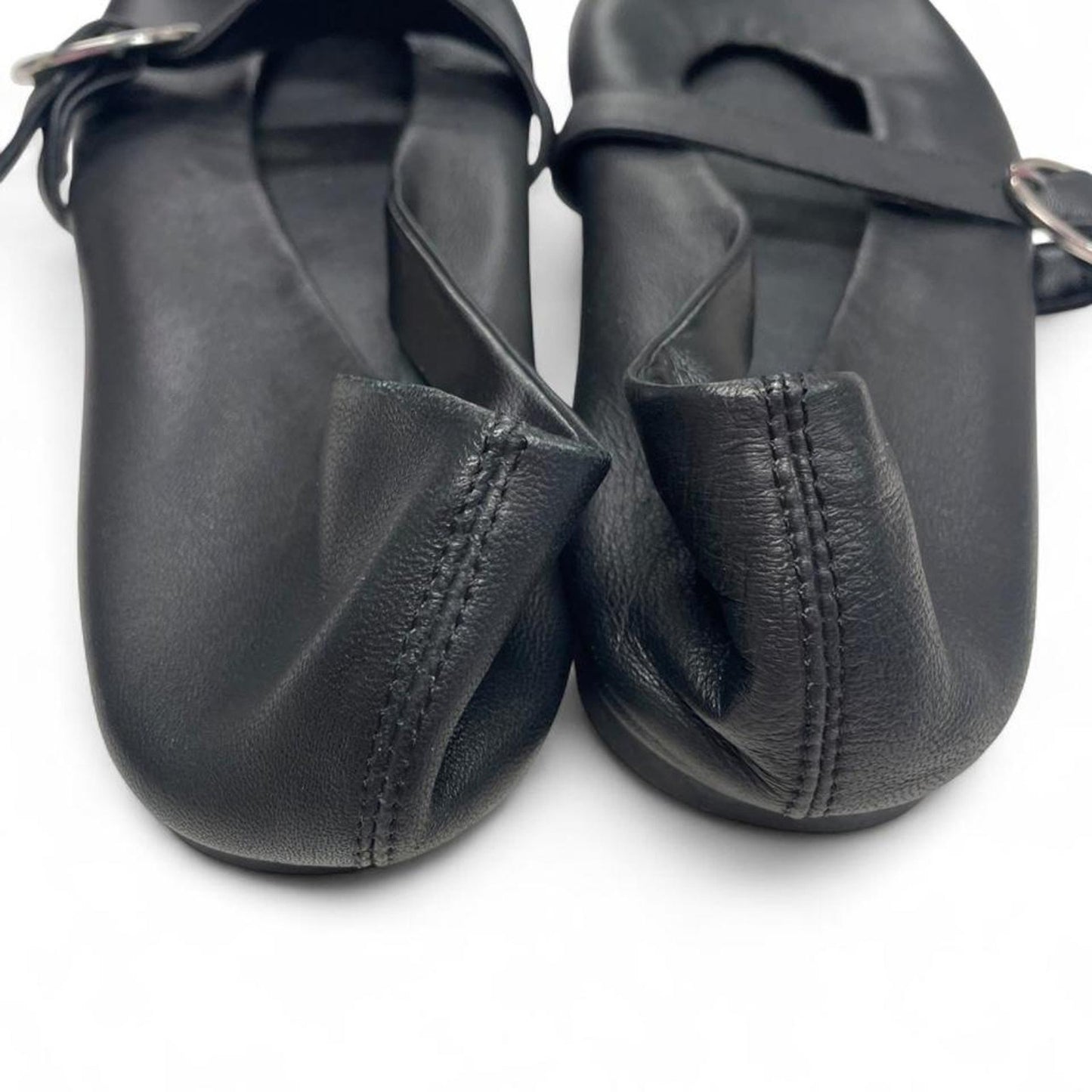 Black leather ballet flats
