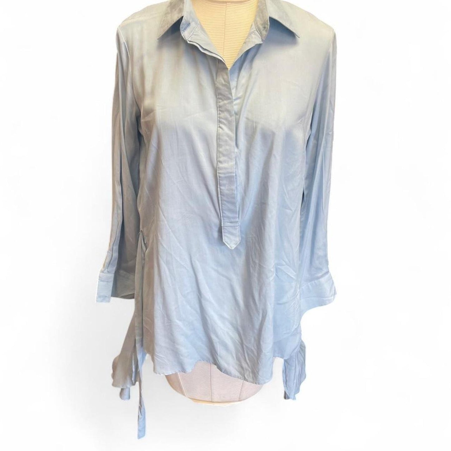 Light blue sheer blouse with