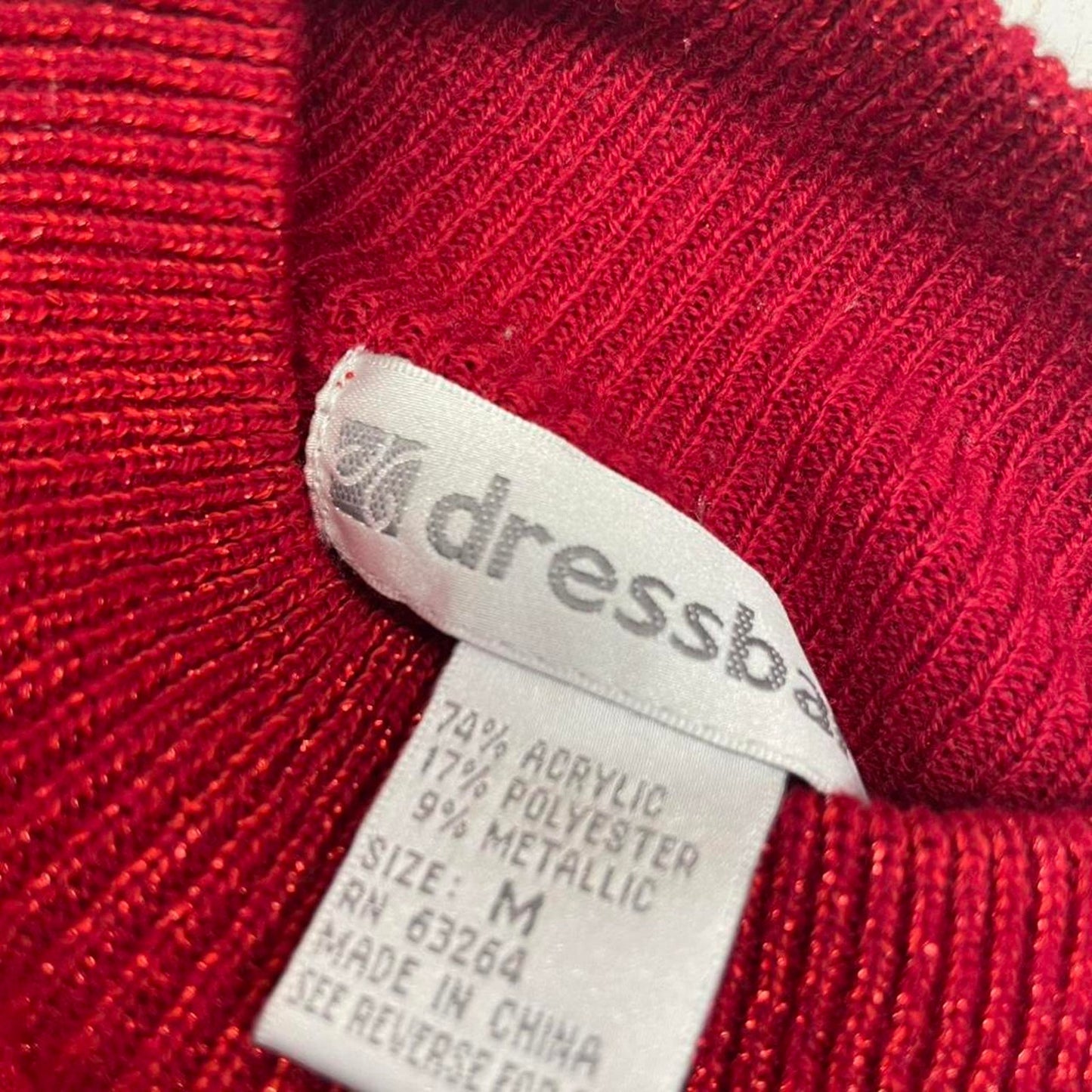 Red turtleneck sweater with metallic