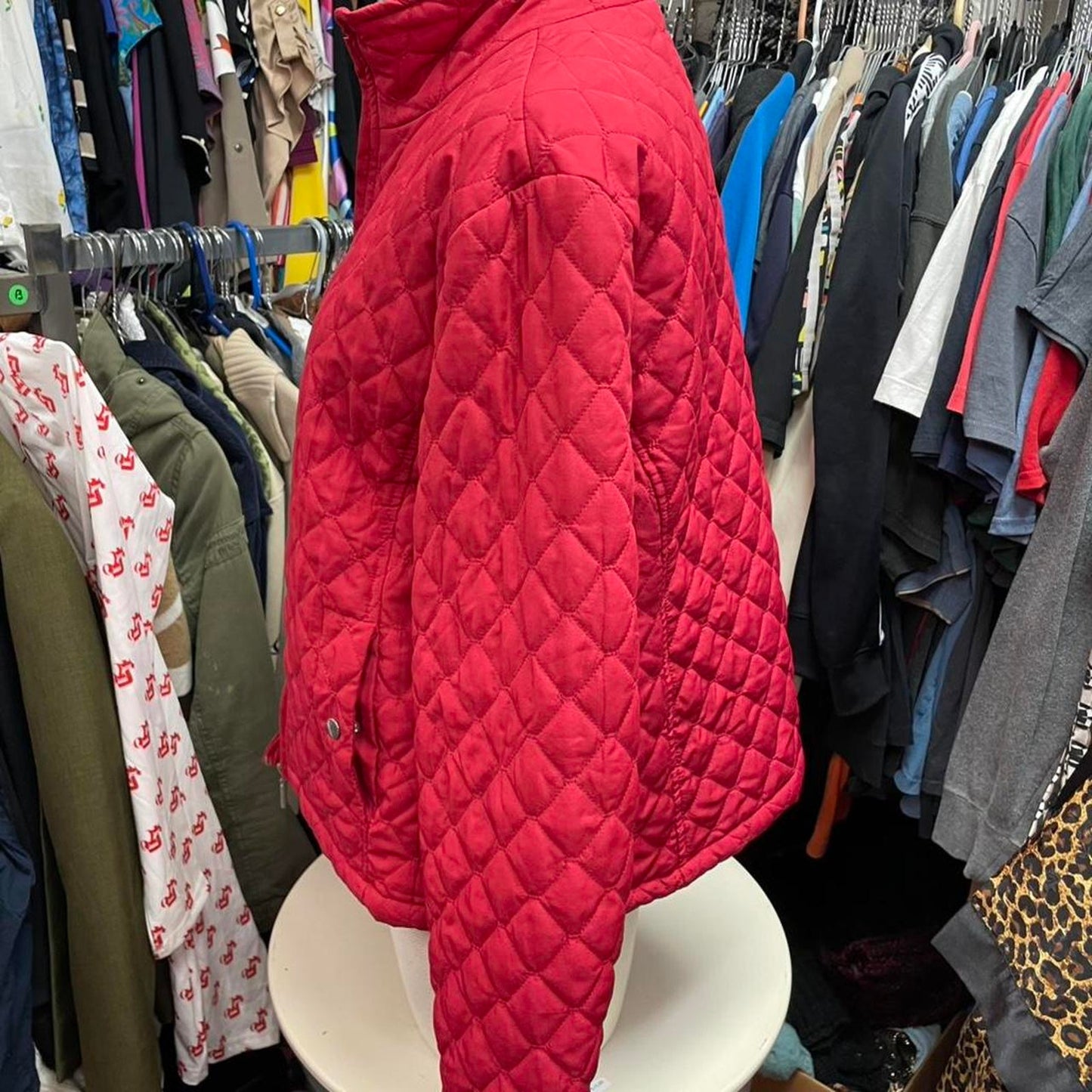 Red quilted jacket with zipper