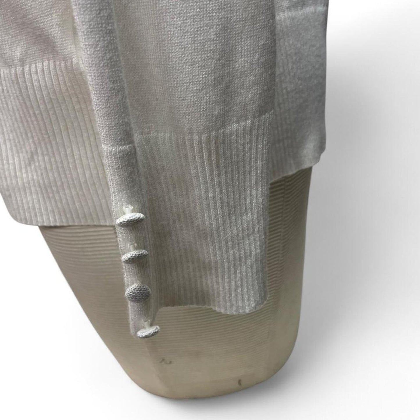 White turtleneck sweater with a