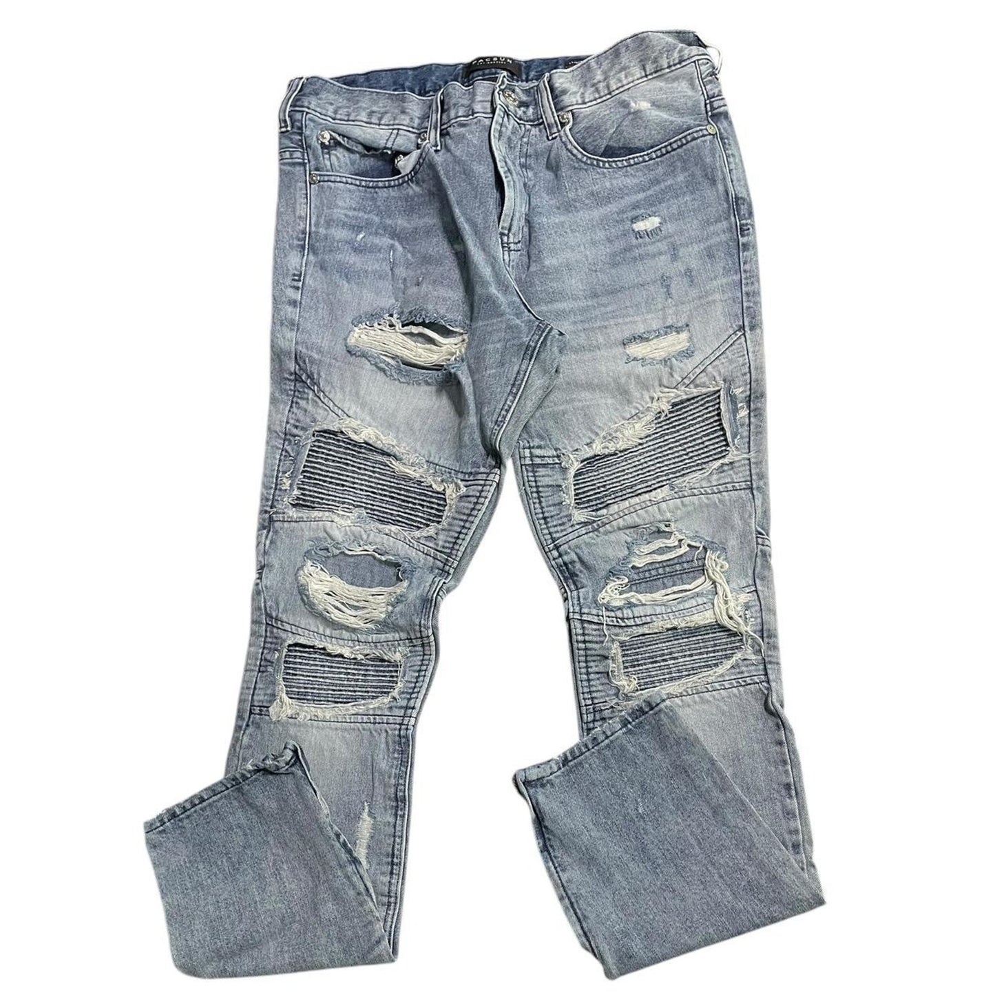 Distressed blue ripped jeans