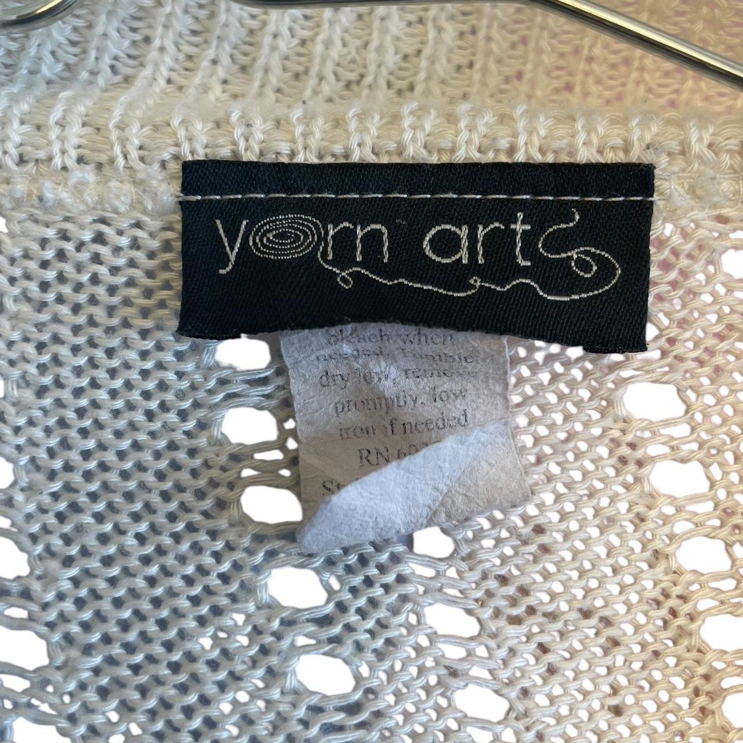 Cream crochet cardigan with a