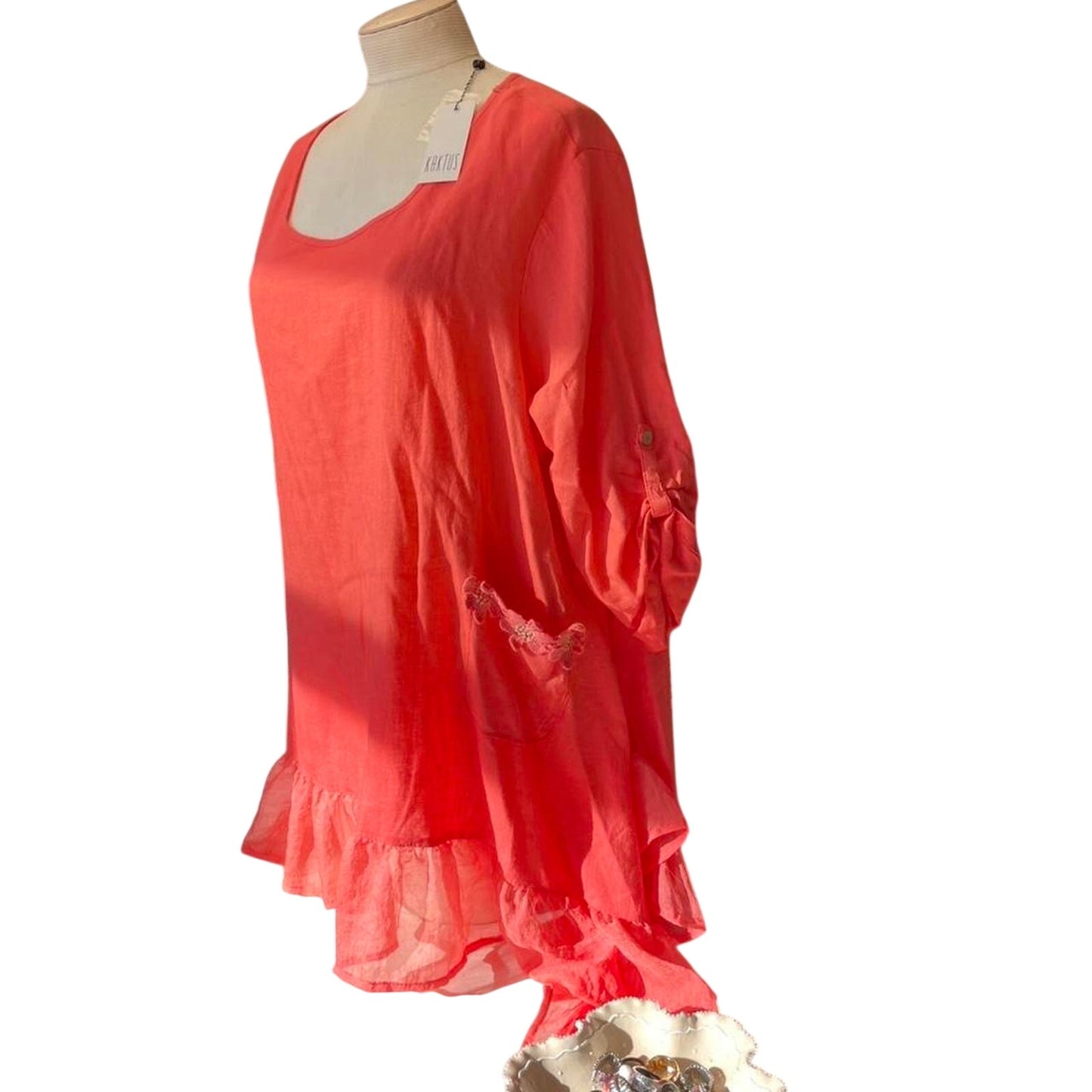 Coral ruffle top with button